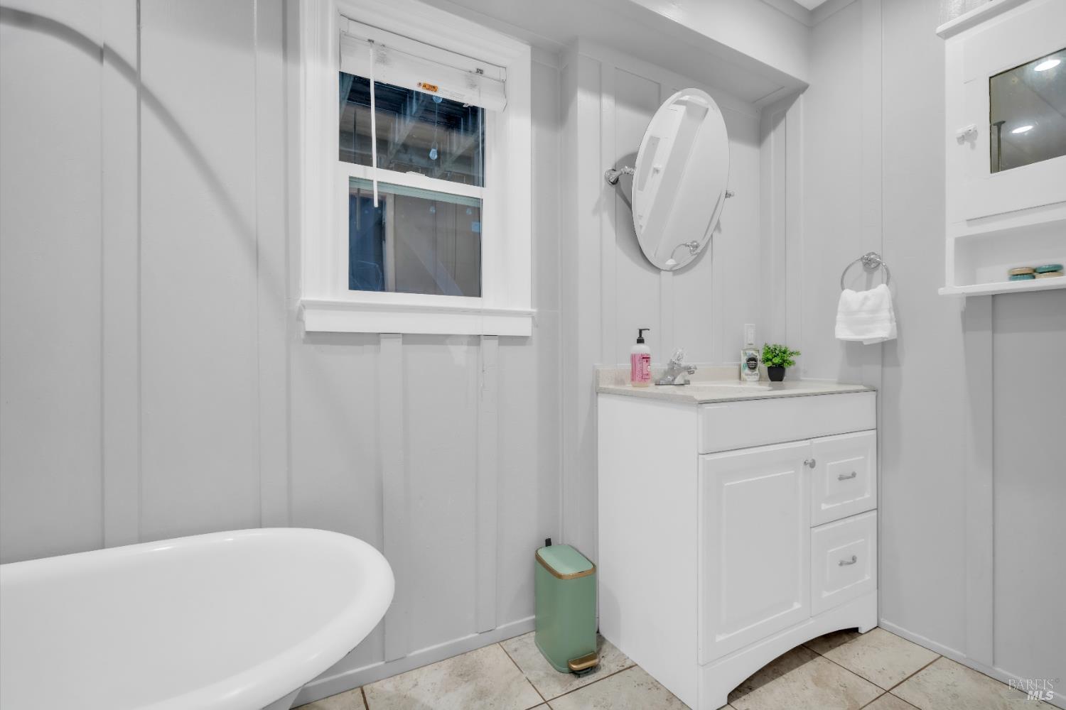 11 Jessup Street San Rafael, CA 94901 - Photo 21 of 54 a bathroom with a tub sink and mirror