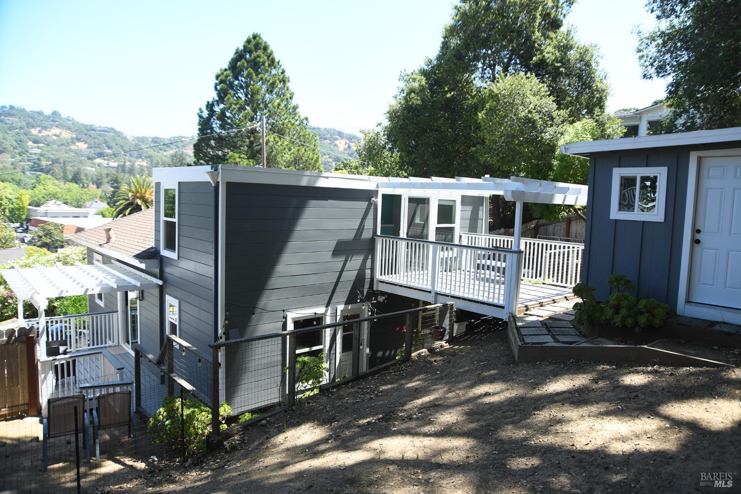 11 Jessup Street San Rafael, CA 94901 - Photo 34 of 54 a backyard of a house with table and chairs