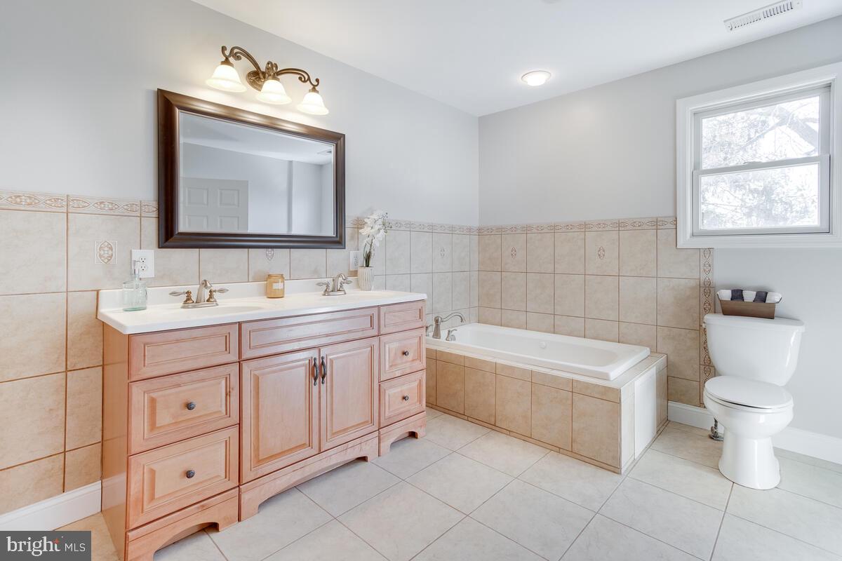 425 Shipley Road Linthicum Heights, MD 21090 - Photo 28 of 45 primary bath-double sinks, linen closet
