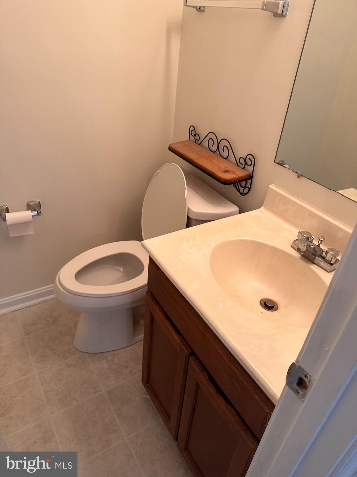 6937 Mayfair Terrace Laurel, MD 20707 - Photo 19 of 36 a bathroom with a sink and a toilet