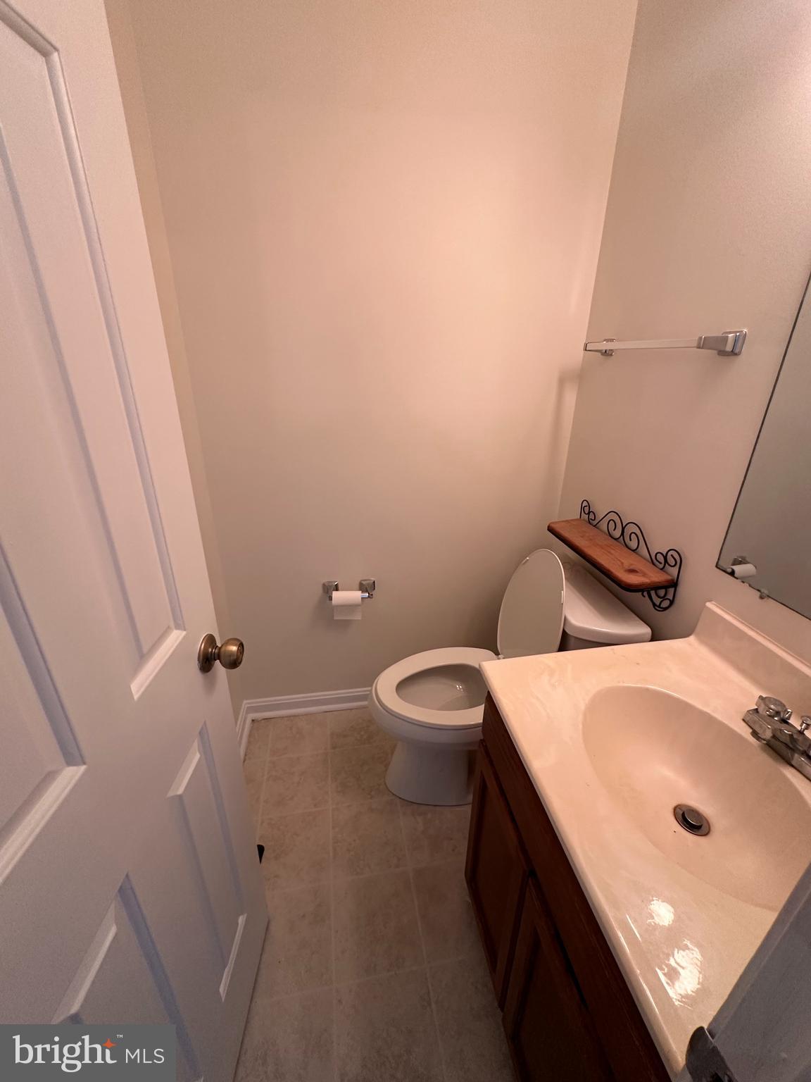 6937 Mayfair Terrace Laurel, MD 20707 - Photo 20 of 36 a bathroom with a sink a toilet and shower