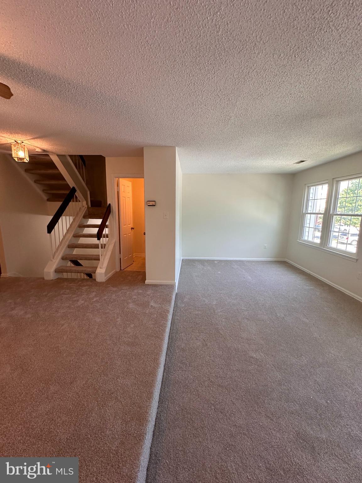 6937 Mayfair Terrace Laurel, MD 20707 - Photo 21 of 36 a view of empty room with stairs