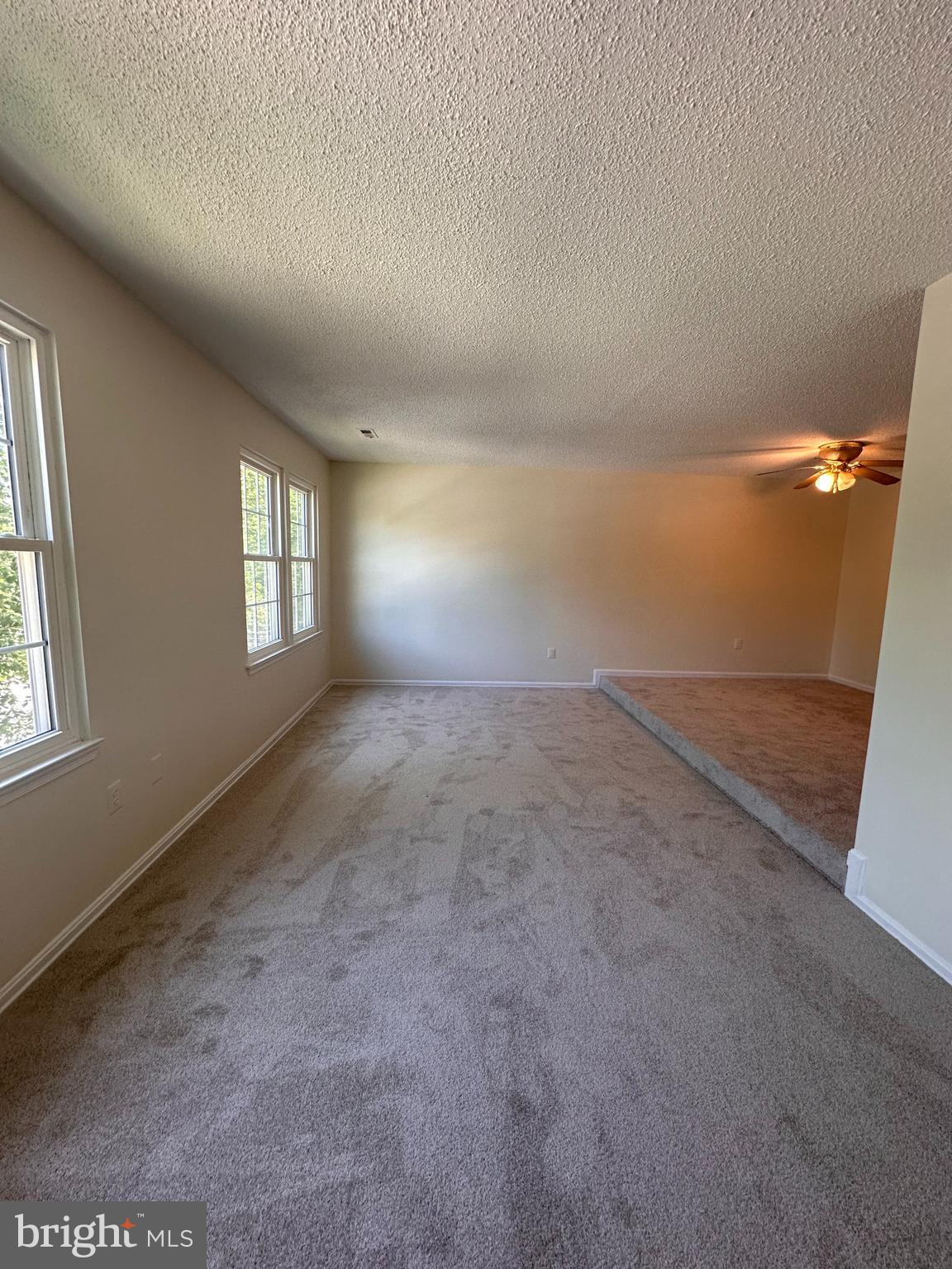 6937 Mayfair Terrace Laurel, MD 20707 - Photo 23 of 36 an empty room with windows and closet