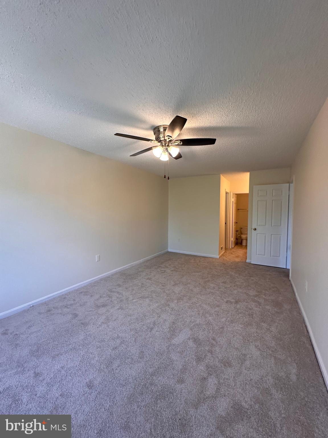 6937 Mayfair Terrace Laurel, MD 20707 - Photo 26 of 36 a view of a livingroom with a ceiling fan and window
