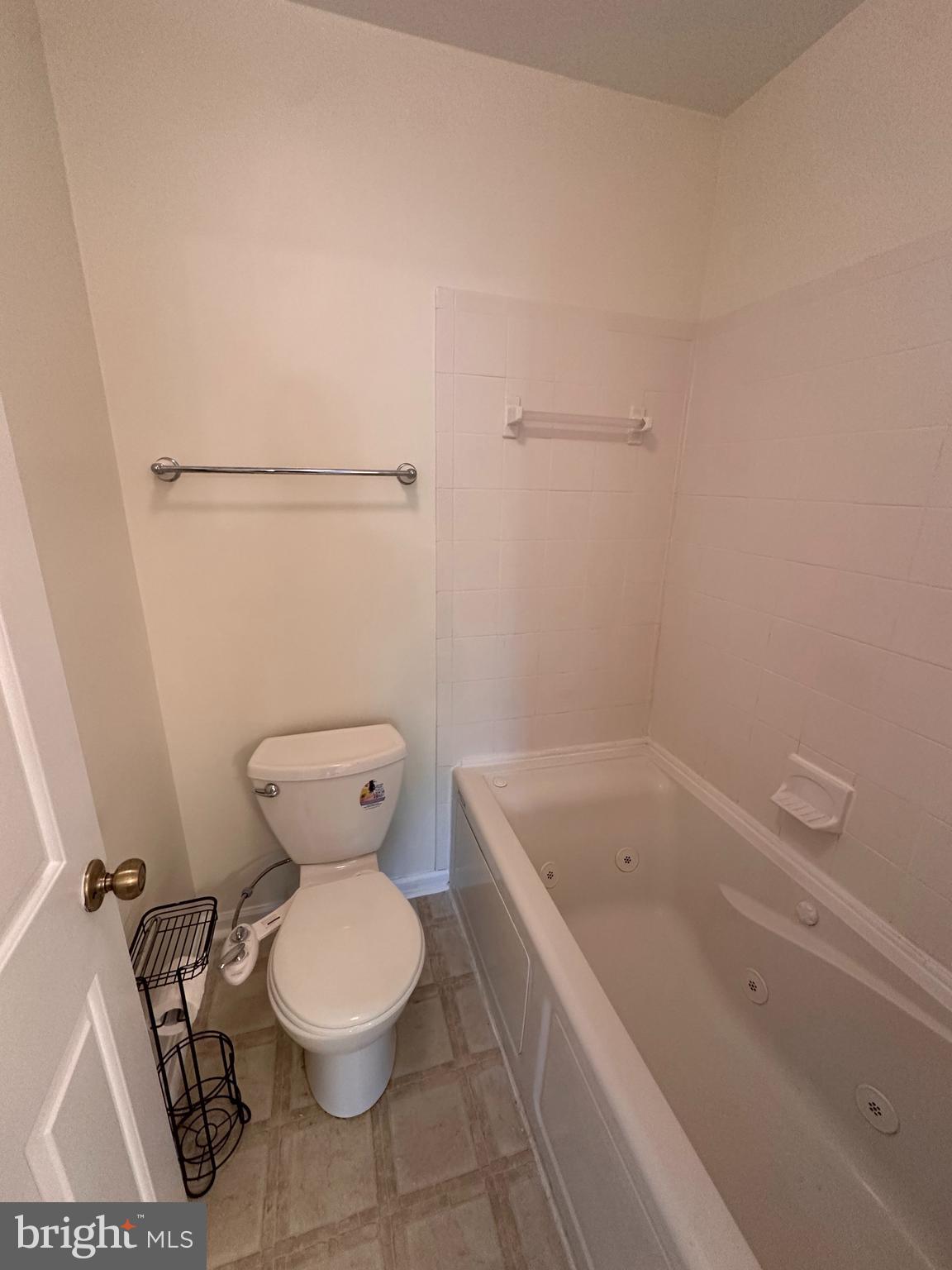 6937 Mayfair Terrace Laurel, MD 20707 - Photo 28 of 36 a white toilet sitting next to a bath tub