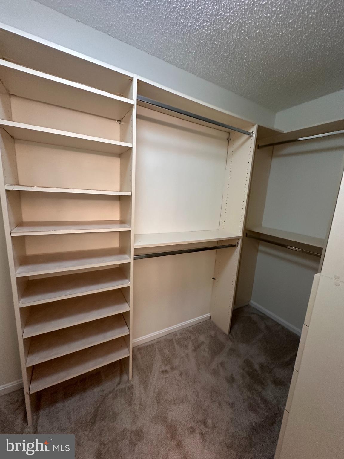 6937 Mayfair Terrace Laurel, MD 20707 - Photo 30 of 36 a view of walk in closet with empty racks