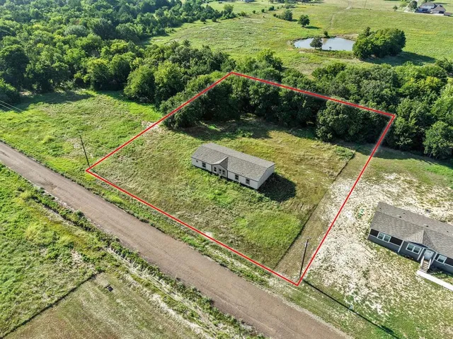 a view of a garden from a balcony
