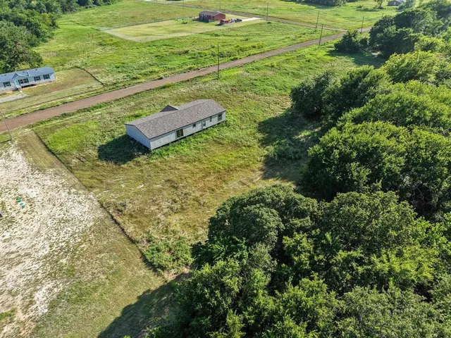 a view of a yard with an outdoor space
