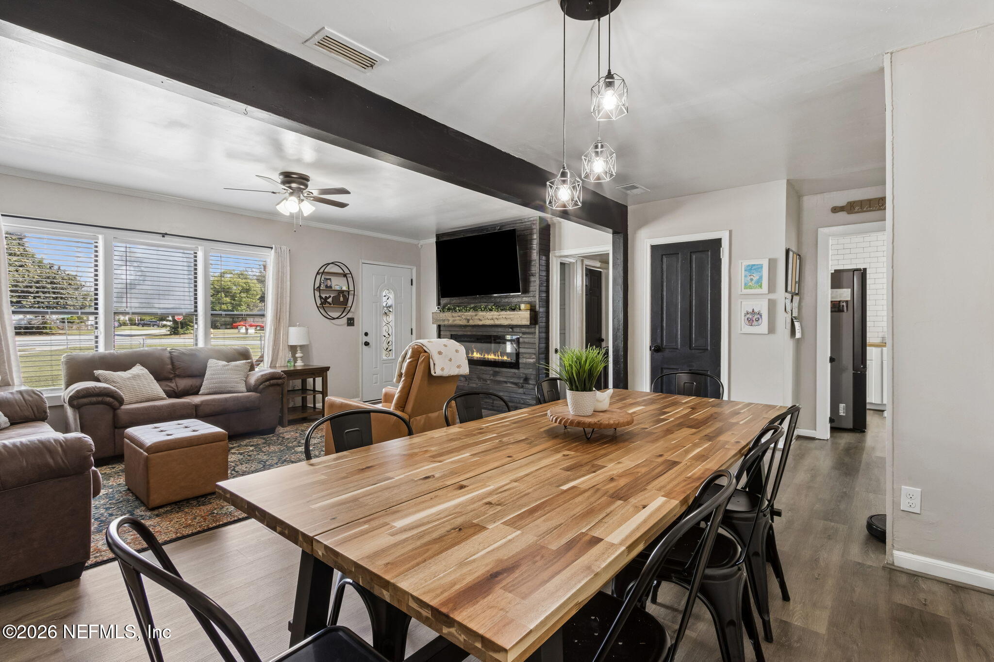 4816 Riverdale Road Jacksonville, FL 32210 - Photo 13 of 49 a view of a dining room with furniture window and wooden floor