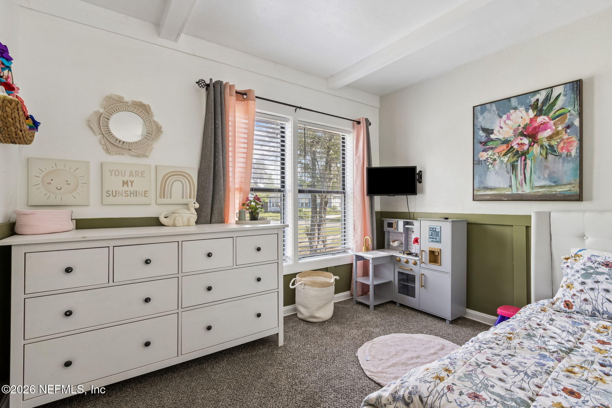 4816 Riverdale Road Jacksonville, FL 32210 - Photo 21 of 49 a living room with furniture and a window