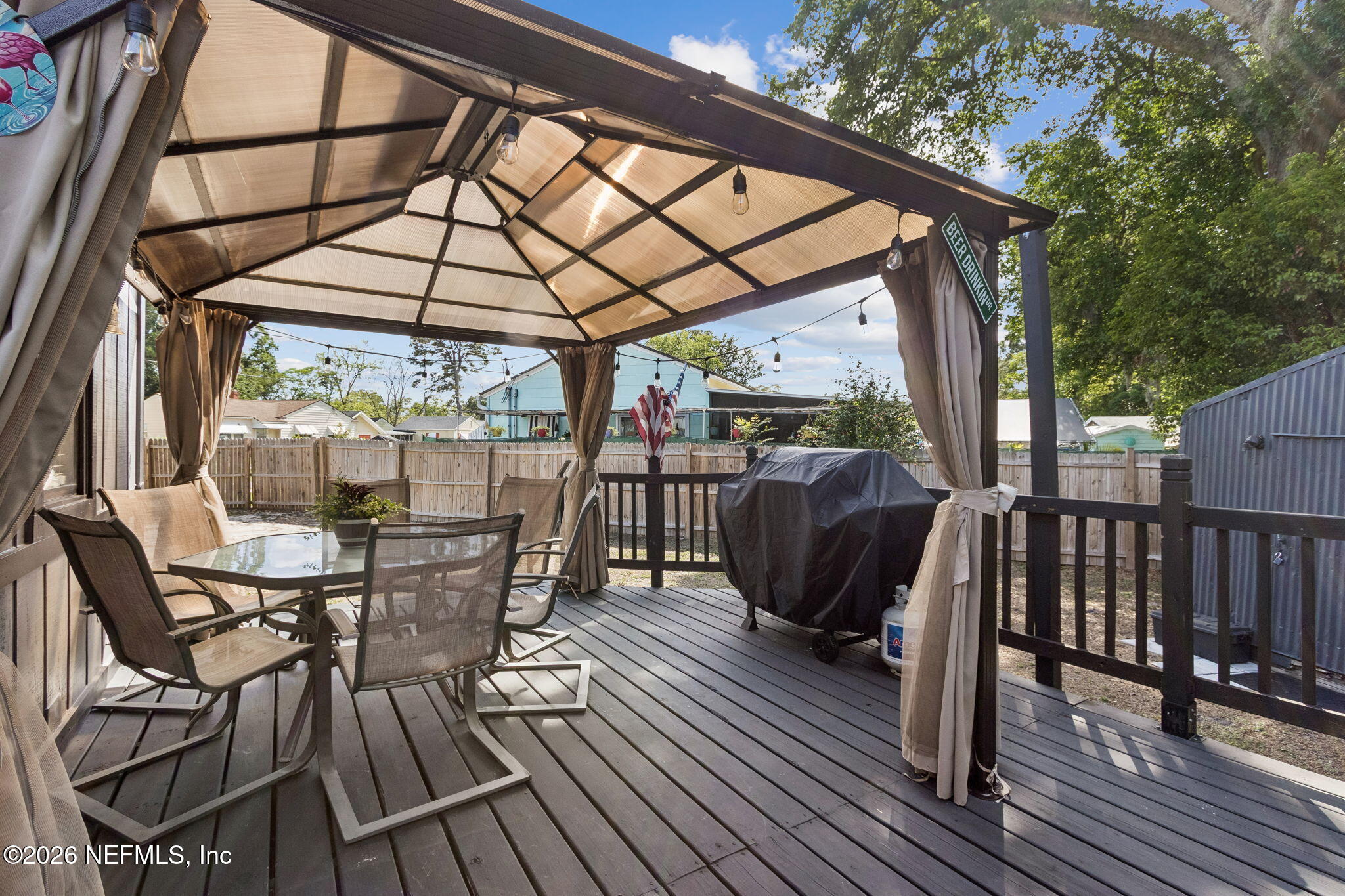 4816 Riverdale Road Jacksonville, FL 32210 - Photo 35 of 49 a view of a chairs and table in the balcony