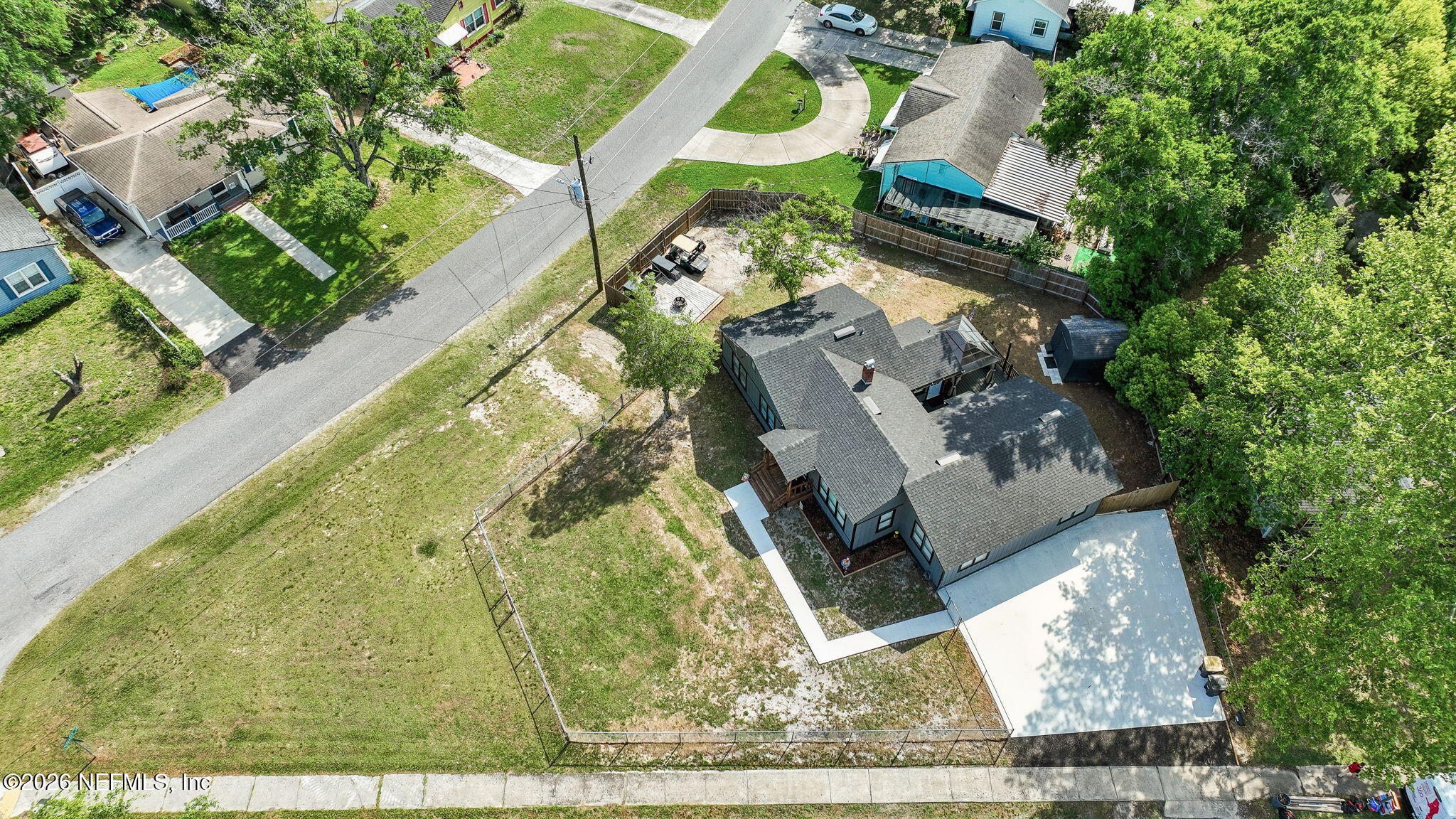 4816 Riverdale Road Jacksonville, FL 32210 - Photo 44 of 49 an aerial view of a house with a garden and swimming pool