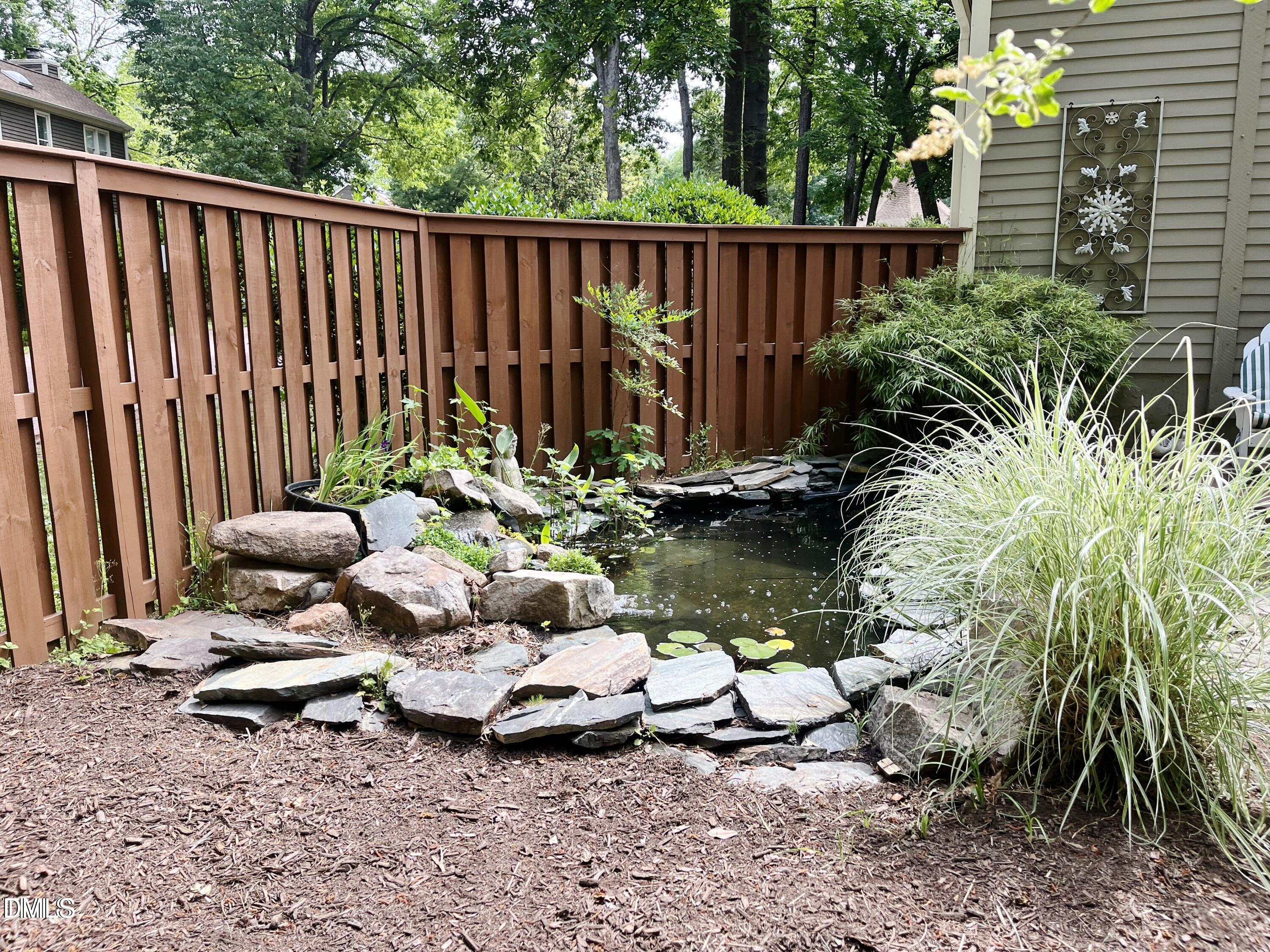 1707 Falls Church Road Raleigh, NC 27609 - Photo 22 of 22 a garden view with a seating space