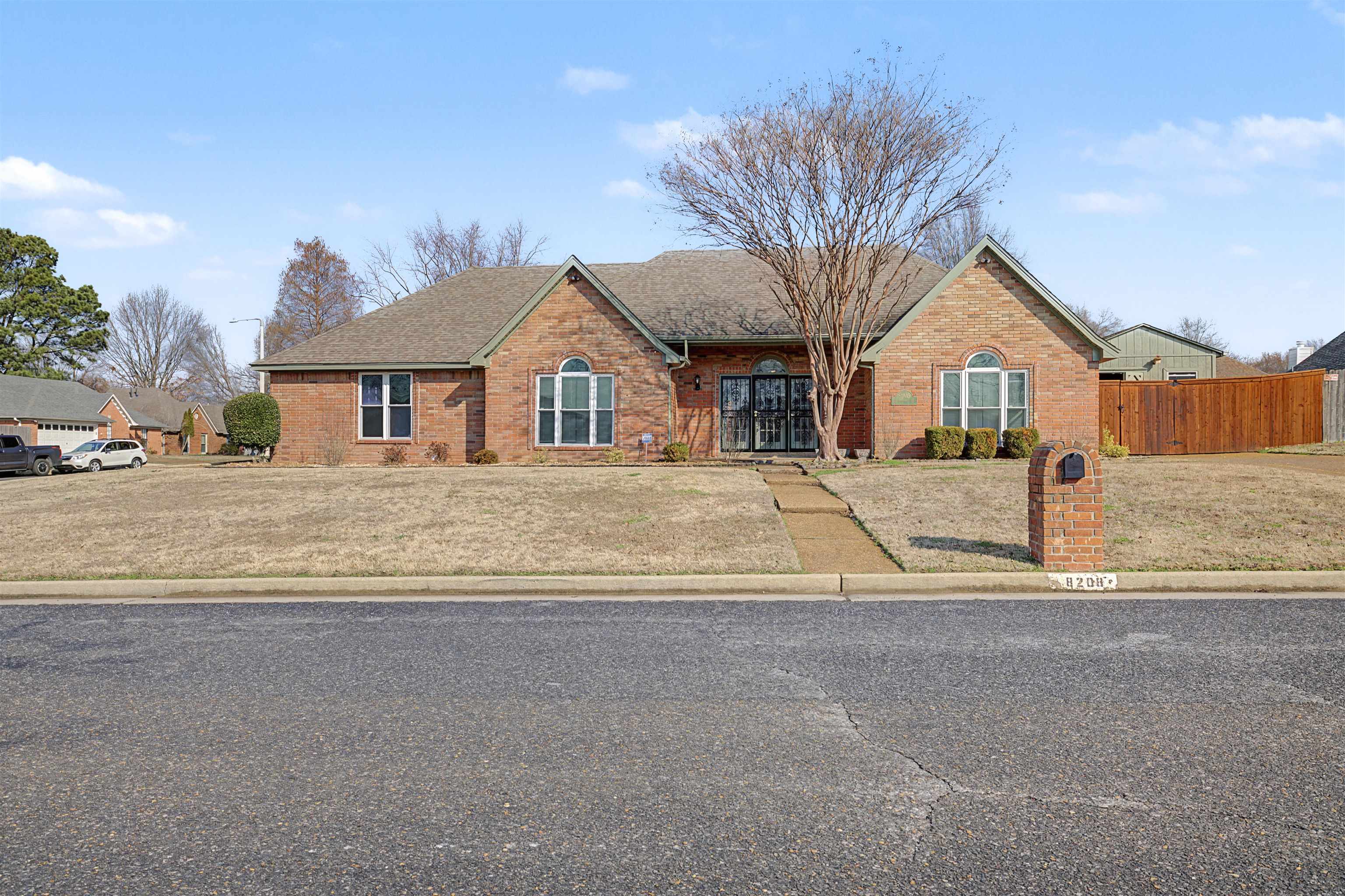 8208 Clinton Way Cove Memphis, TN 38018 - Photo 1 of 31 front view of a house with a small yard