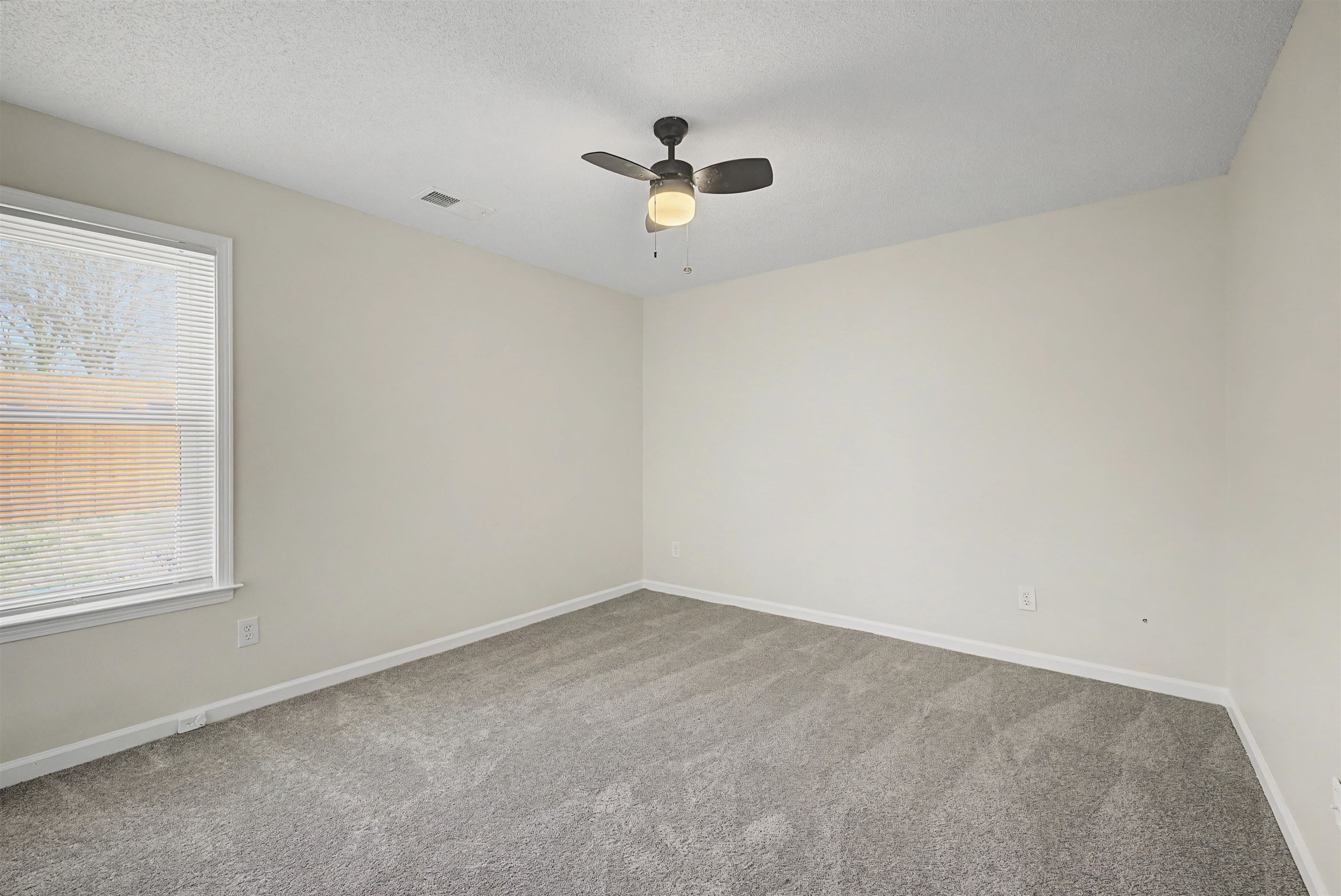 8208 Clinton Way Cove Memphis, TN 38018 - Photo 14 of 31 an empty room with a window