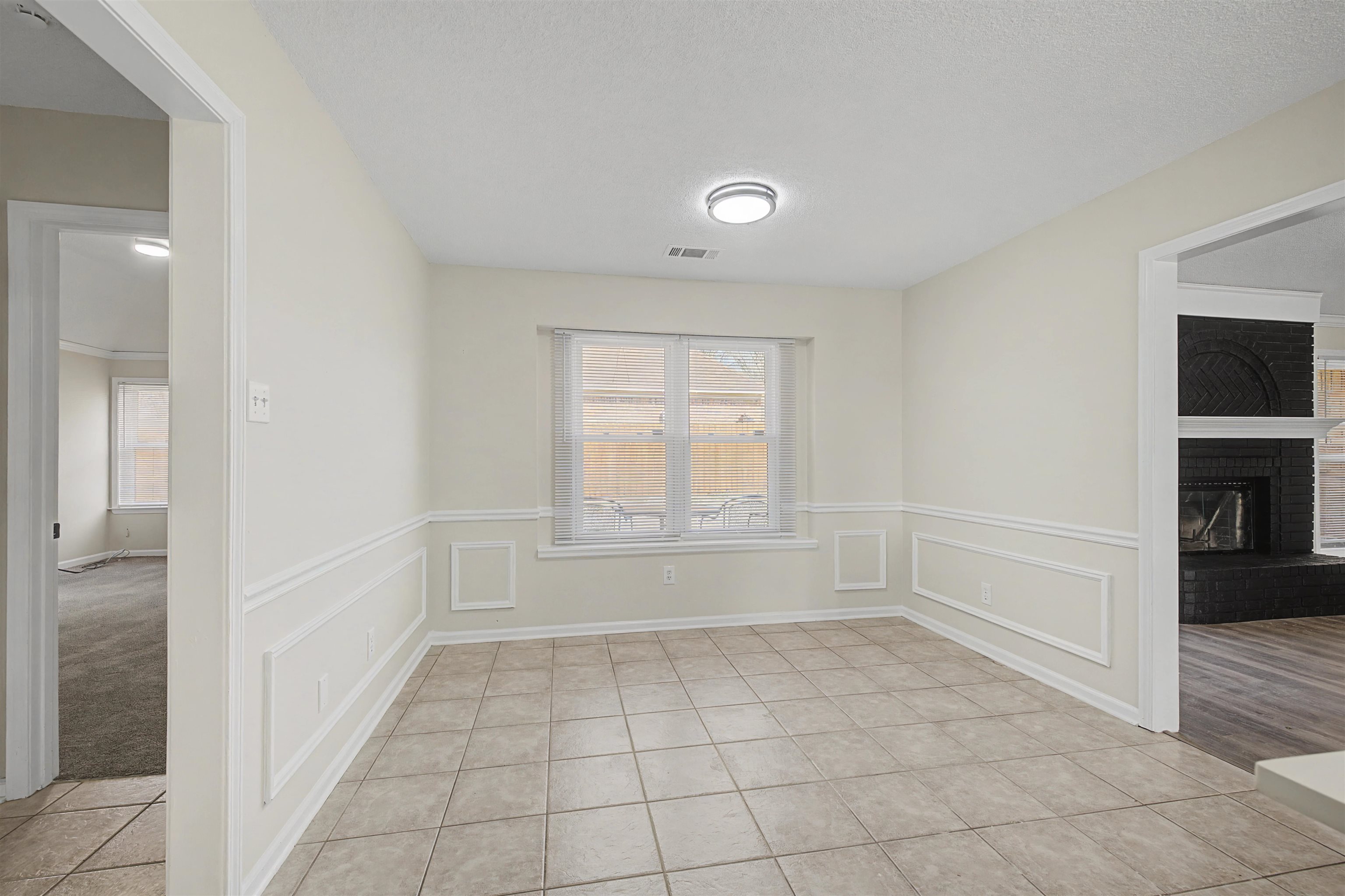8208 Clinton Way Cove Memphis, TN 38018 - Photo 17 of 31 a view of an empty room and window