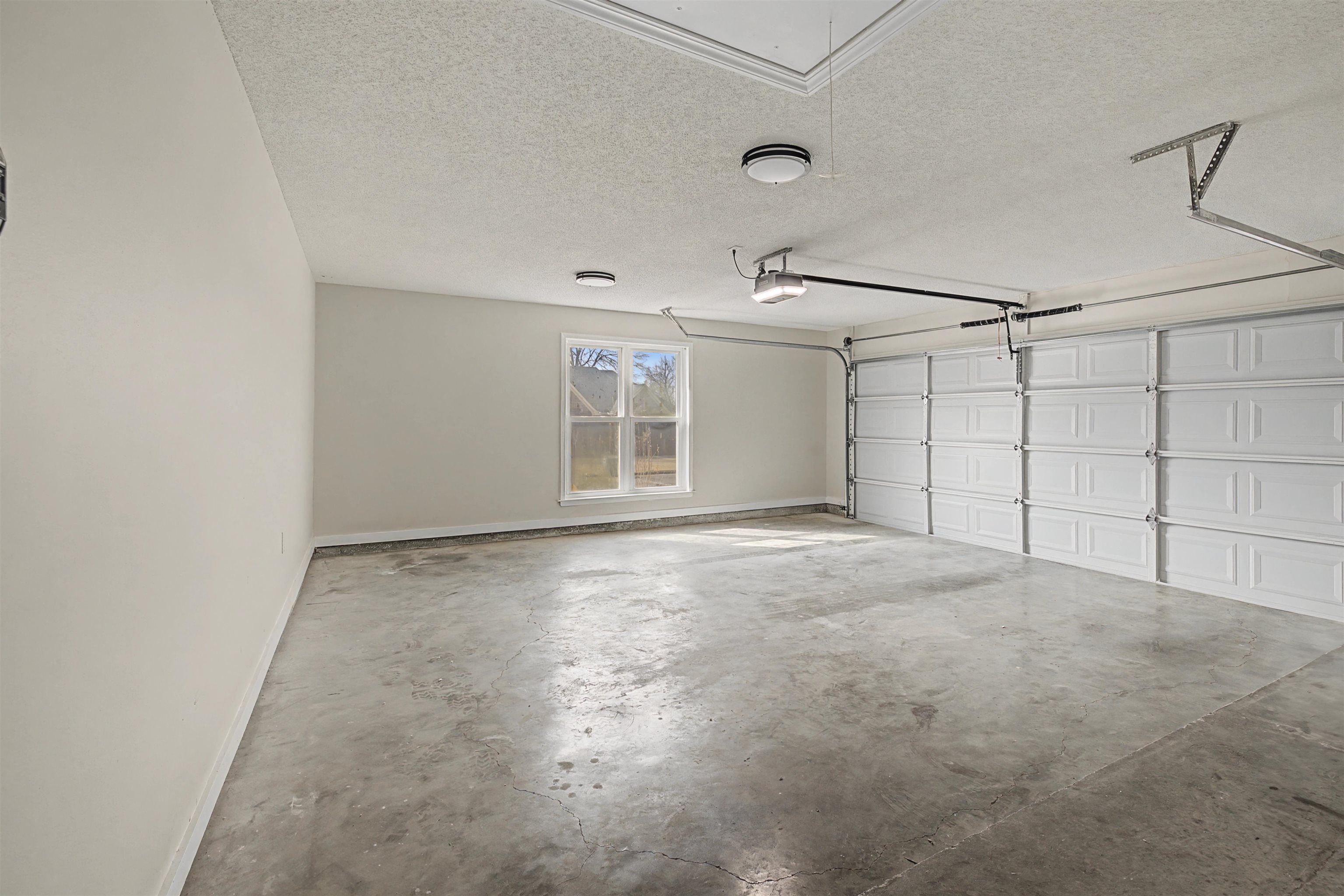 8208 Clinton Way Cove Memphis, TN 38018 - Photo 26 of 31 a view of a livingroom with an empty space and a window
