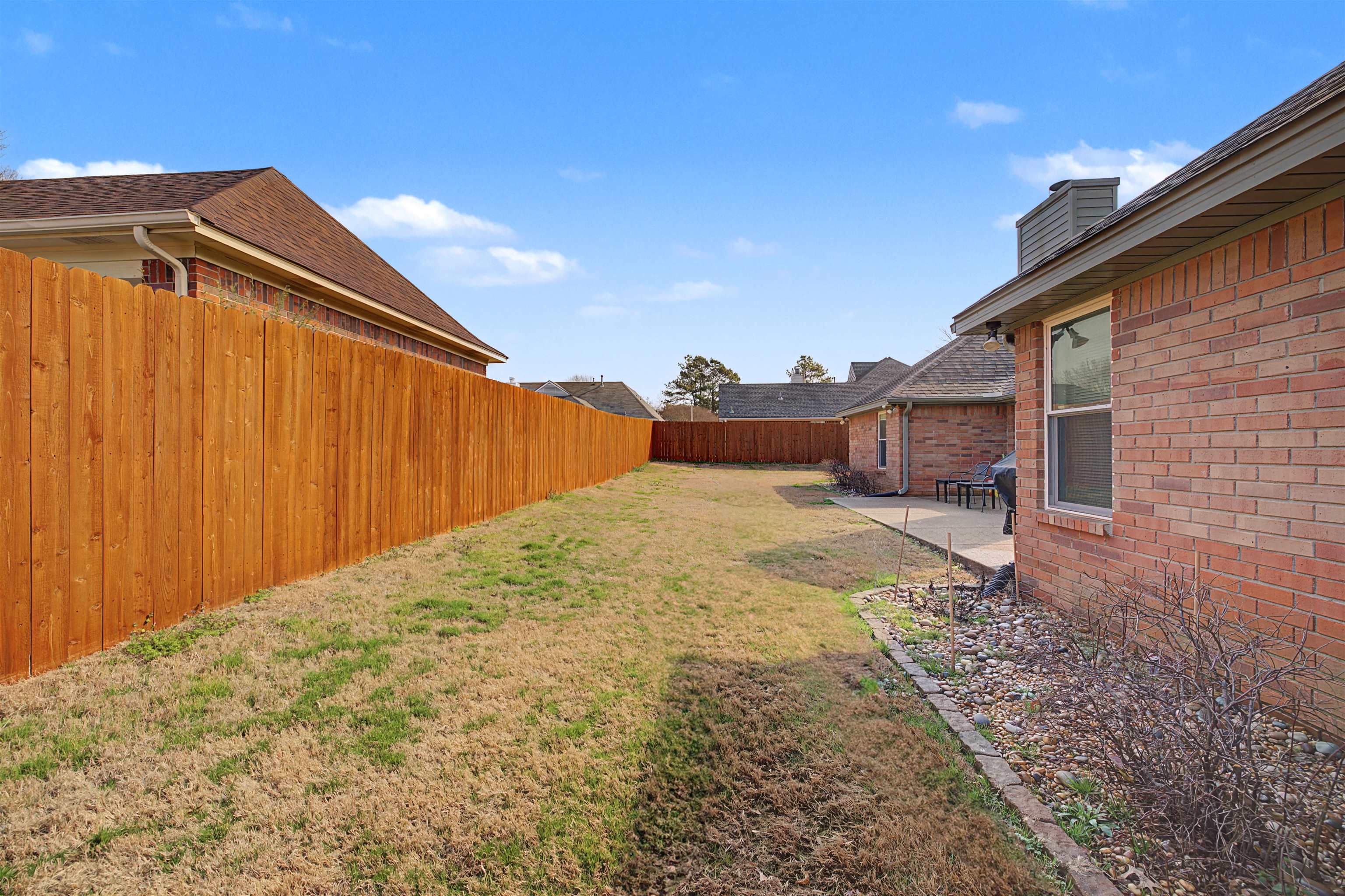 8208 Clinton Way Cove Memphis, TN 38018 - Photo 27 of 31 a backyard of a house