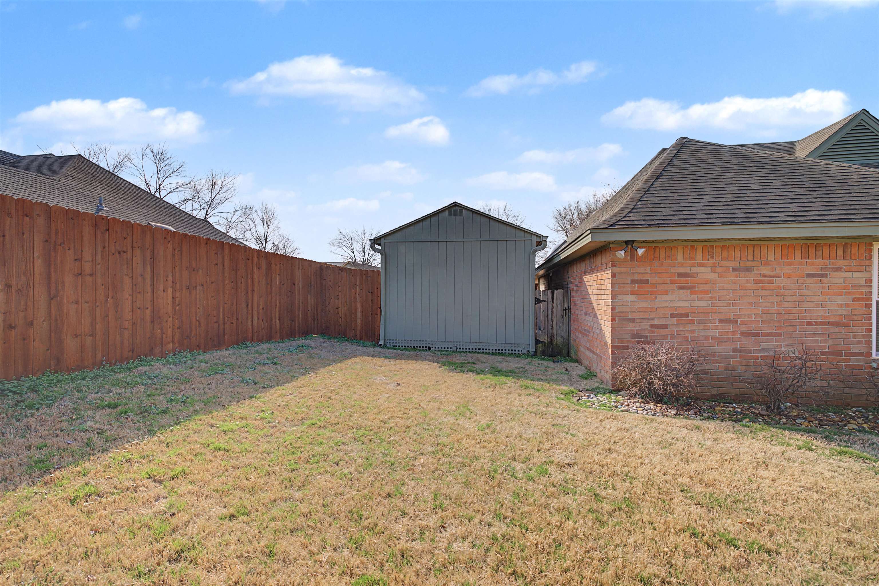 8208 Clinton Way Cove Memphis, TN 38018 - Photo 29 of 31 a backyard of a house