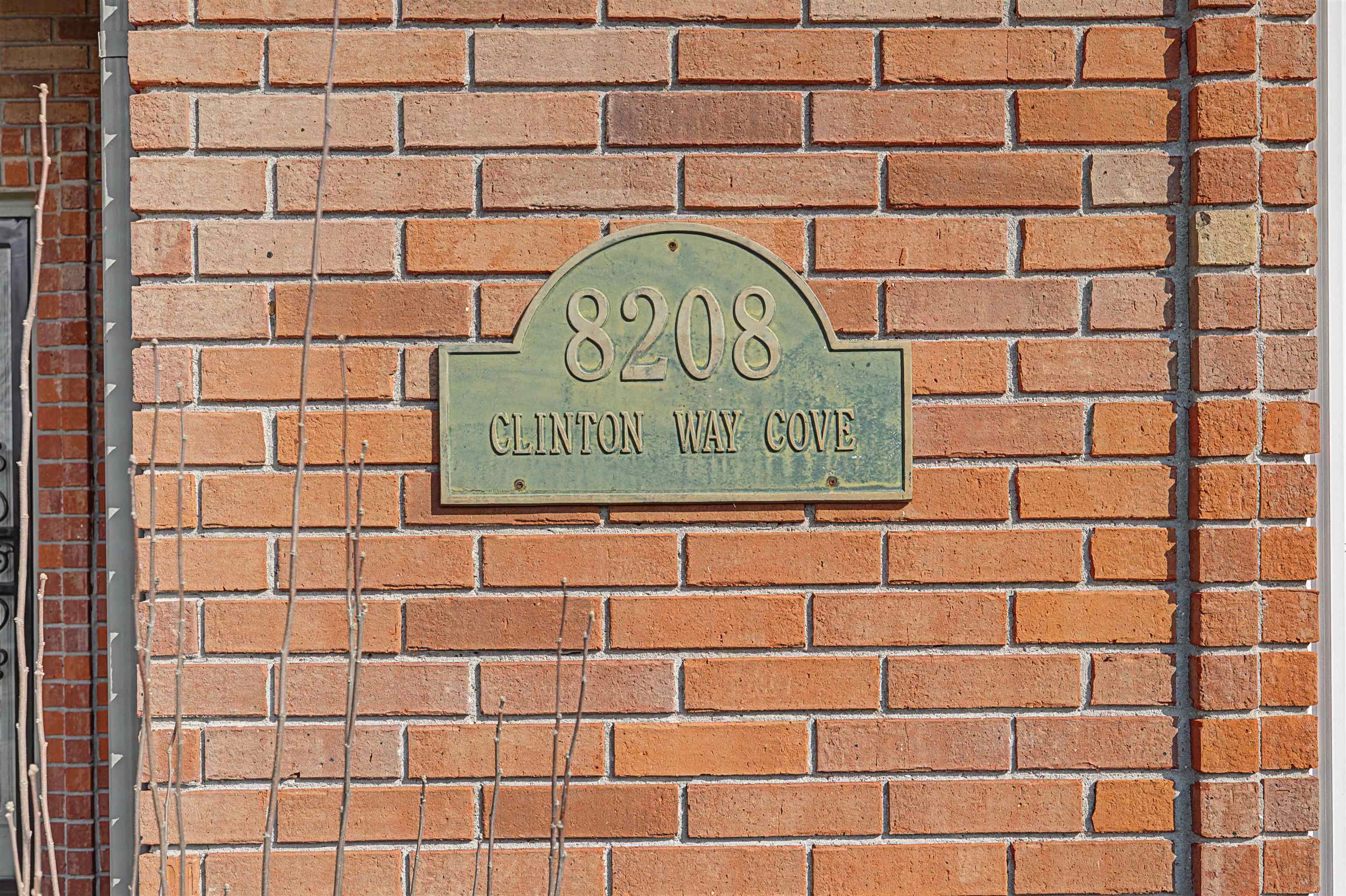 8208 Clinton Way Cove Memphis, TN 38018 - Photo 3 of 31 a sign on the wall