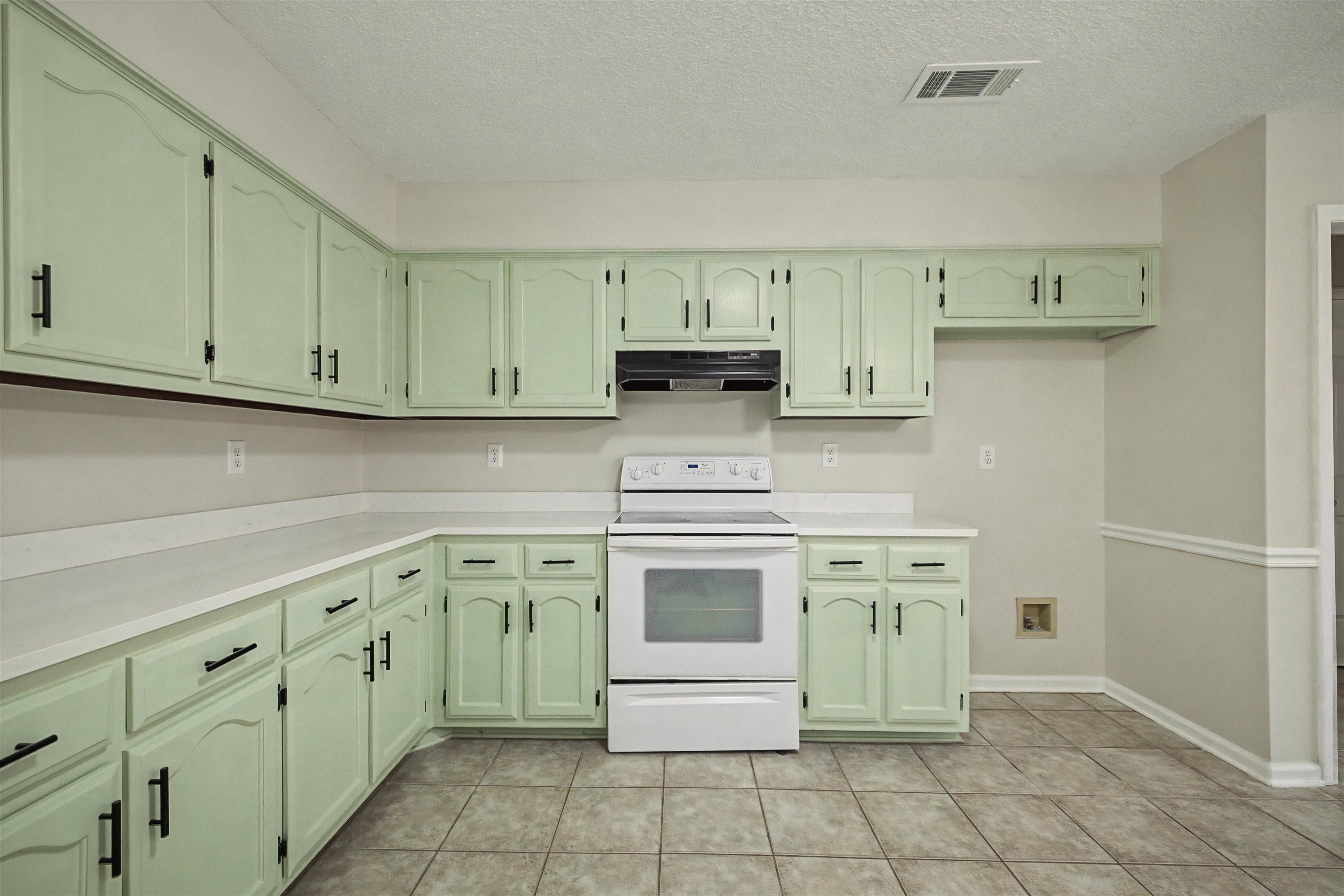 8208 Clinton Way Cove Memphis, TN 38018 - Photo 5 of 31 a kitchen with cabinets appliances and a sink