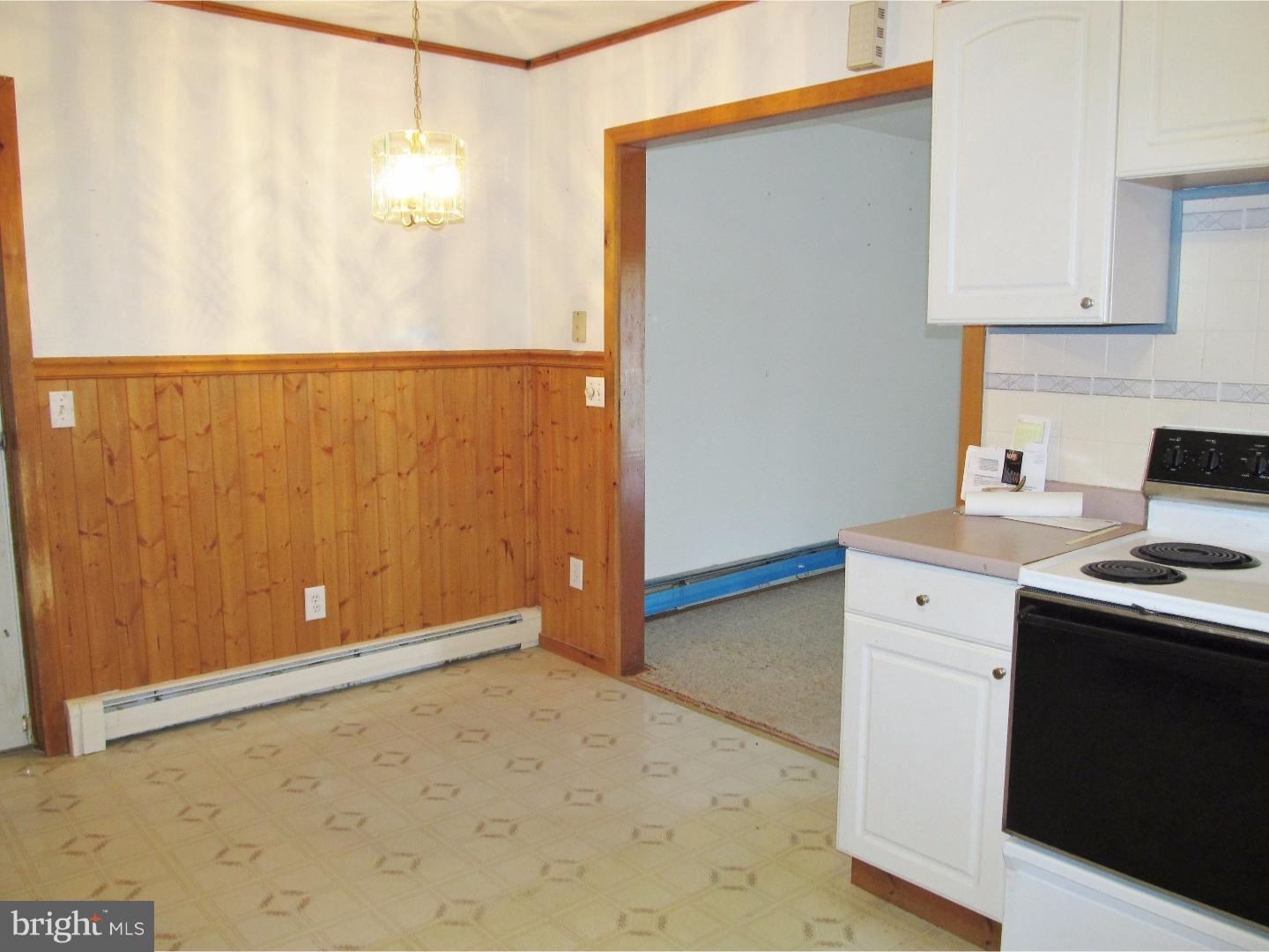 12 Scrapetown Road Pemberton, NJ 08068 - Photo 5 of 11 a kitchen with a sink and cabinets