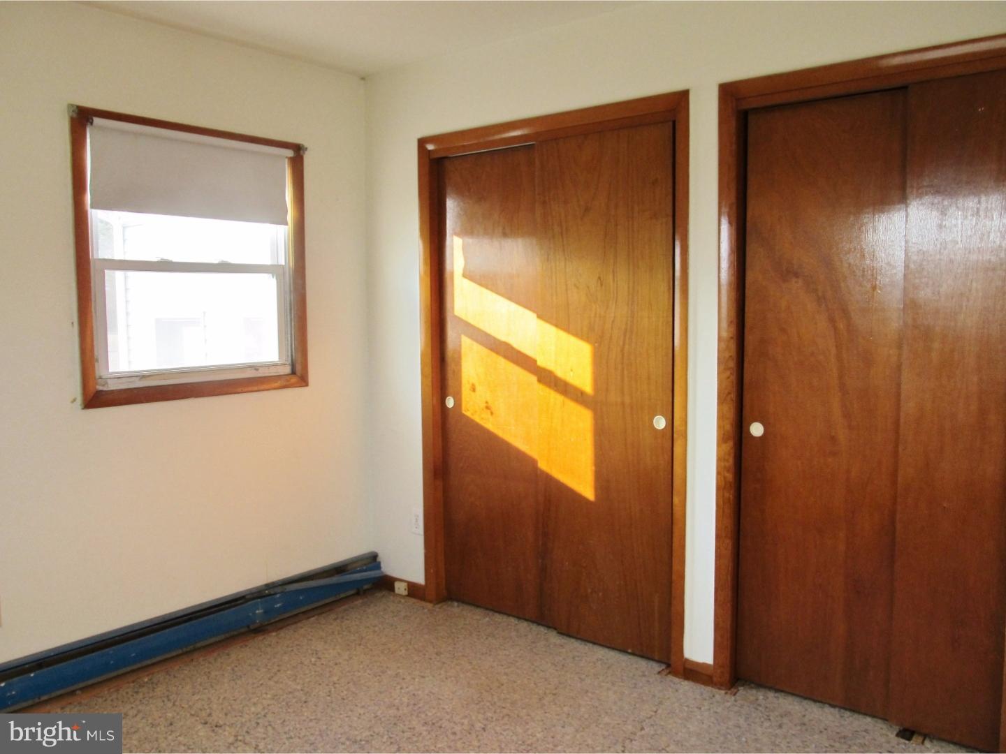 12 Scrapetown Road Pemberton, NJ 08068 - Photo 8 of 11 an empty room with windows and closet