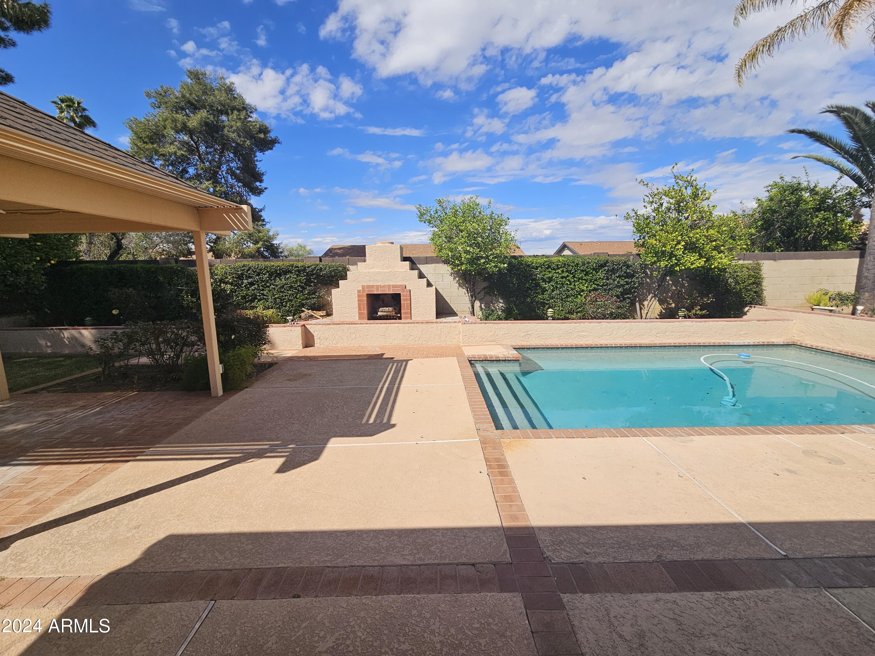 948 East Grandview Road Phoenix, AZ 85022 - Photo 31 of 43 a view of yard with large trees