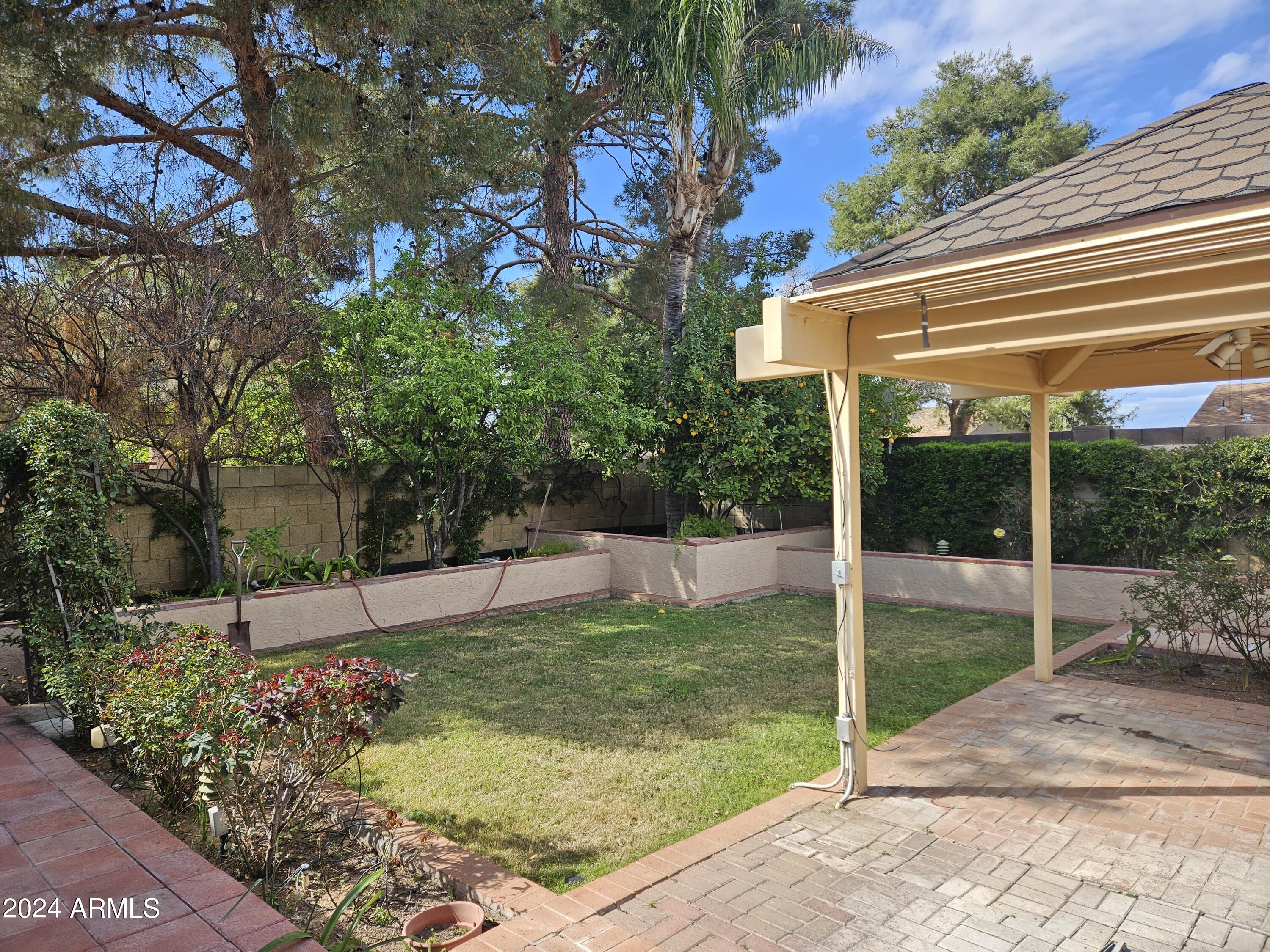 948 East Grandview Road Phoenix, AZ 85022 - Photo 33 of 43 a view of a backyard with a garden
