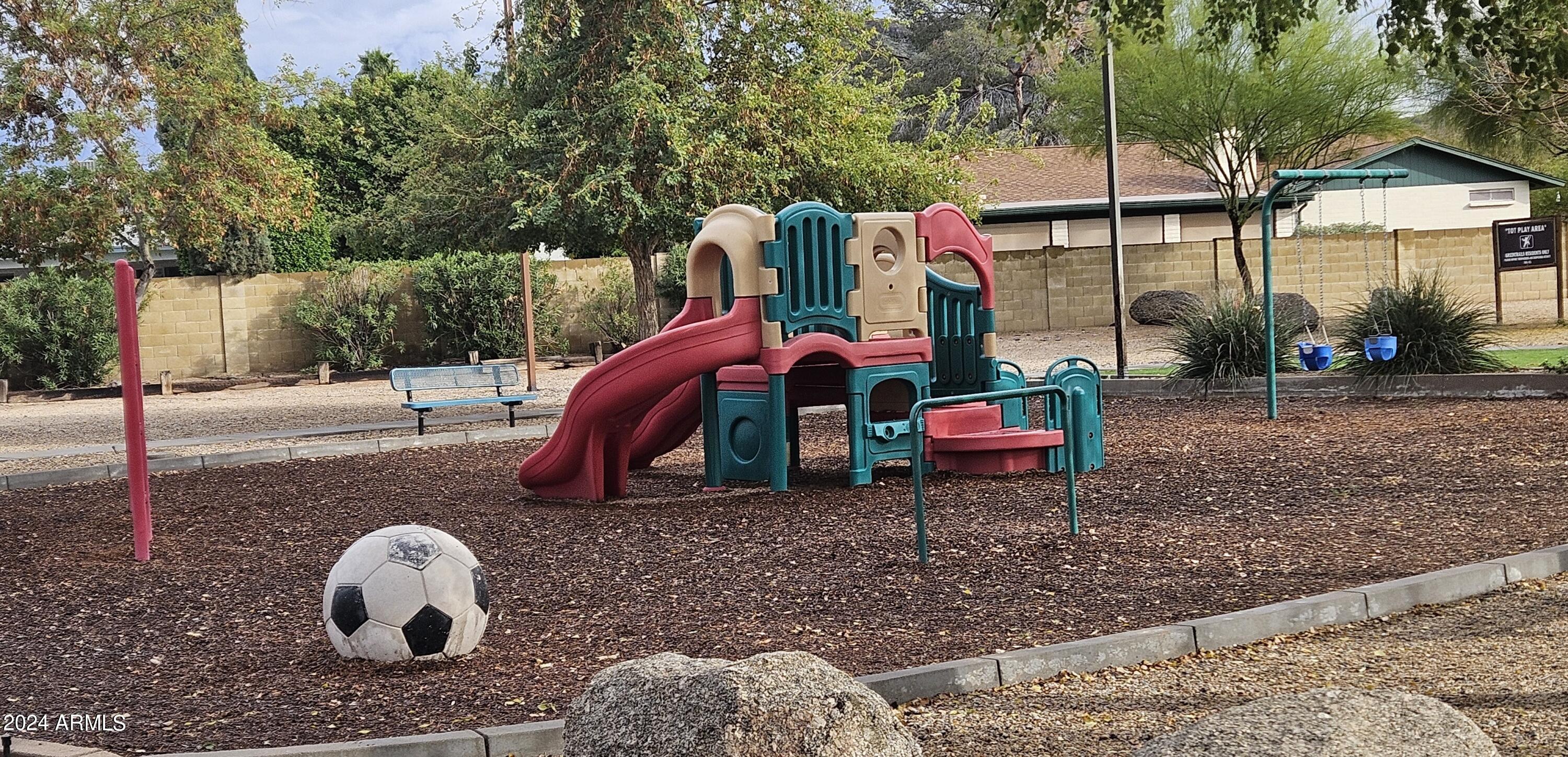948 East Grandview Road Phoenix, AZ 85022 - Photo 38 of 43 a backyard of a house with table and chairs