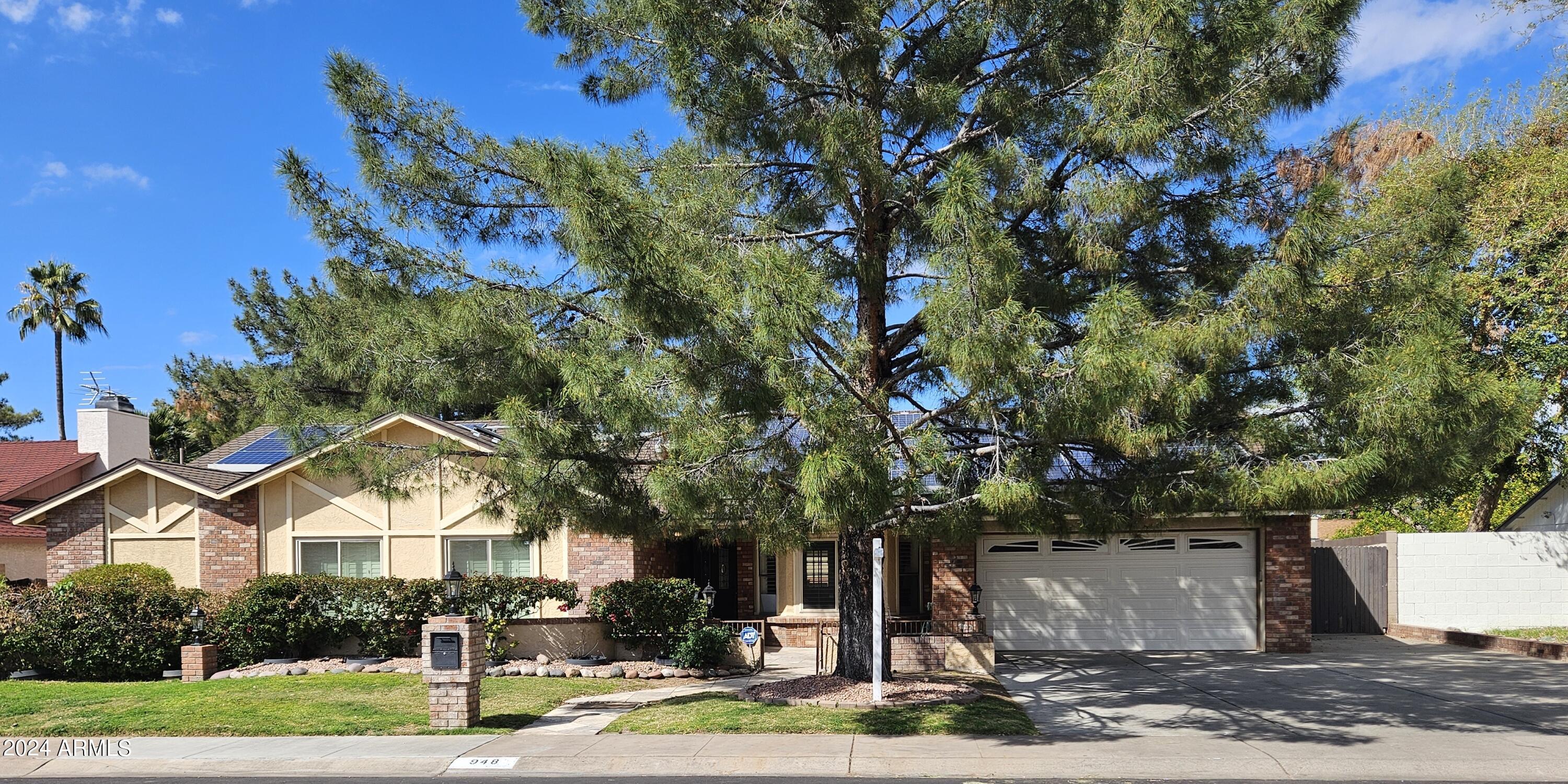 948 East Grandview Road Phoenix, AZ 85022 - Photo 43 of 43 a front view of a house with a yard