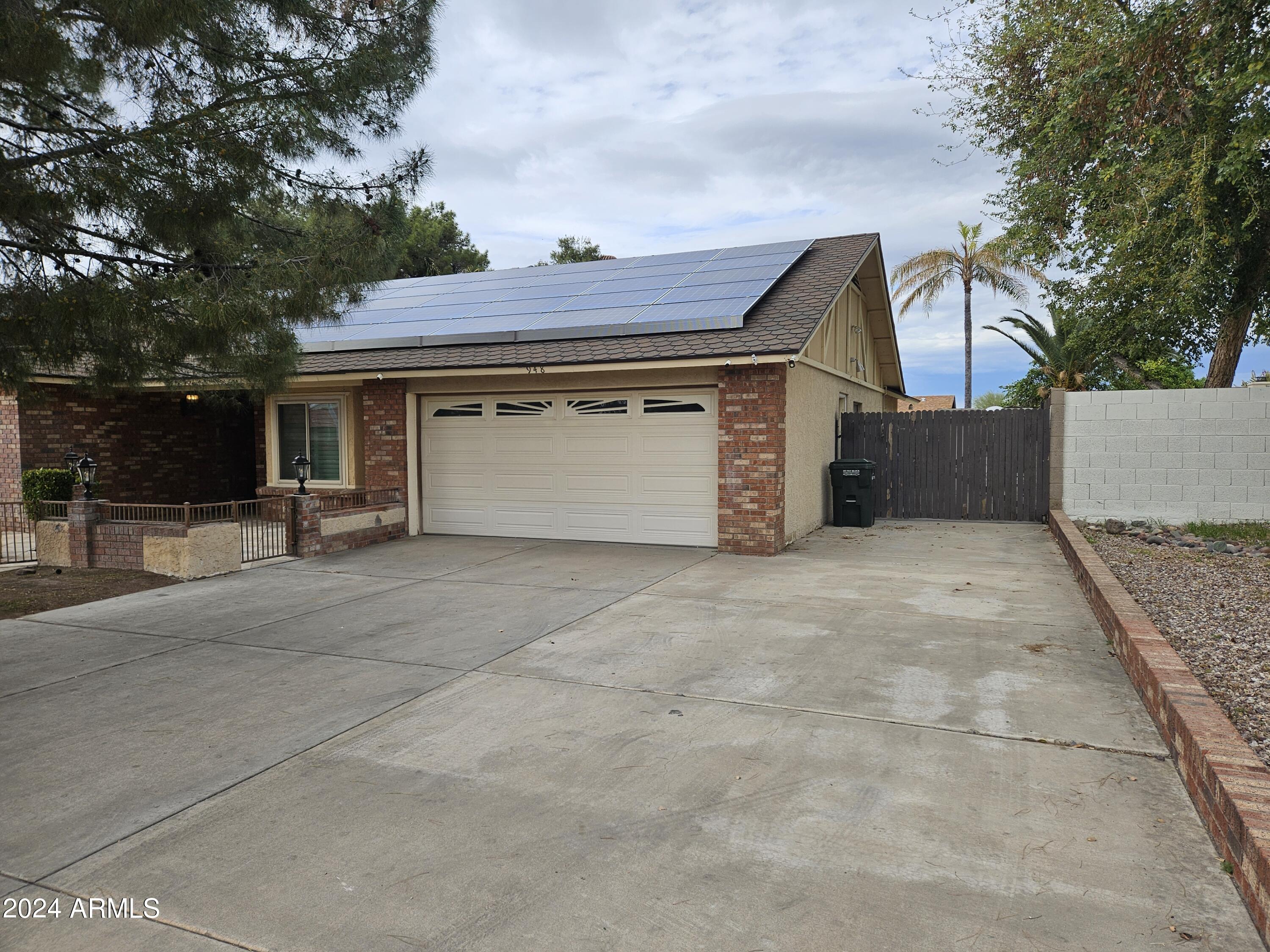 948 East Grandview Road Phoenix, AZ 85022 - Photo 5 of 43 front view of a house with a garage