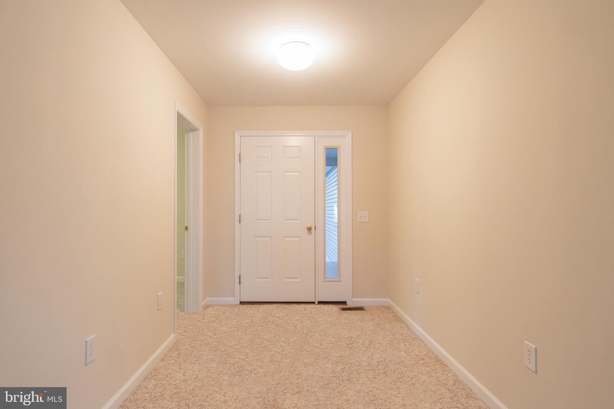 49701 Airedele Road Ridge, MD 20680 - Photo 12 of 53 Entry foyer - New laminate will be installed