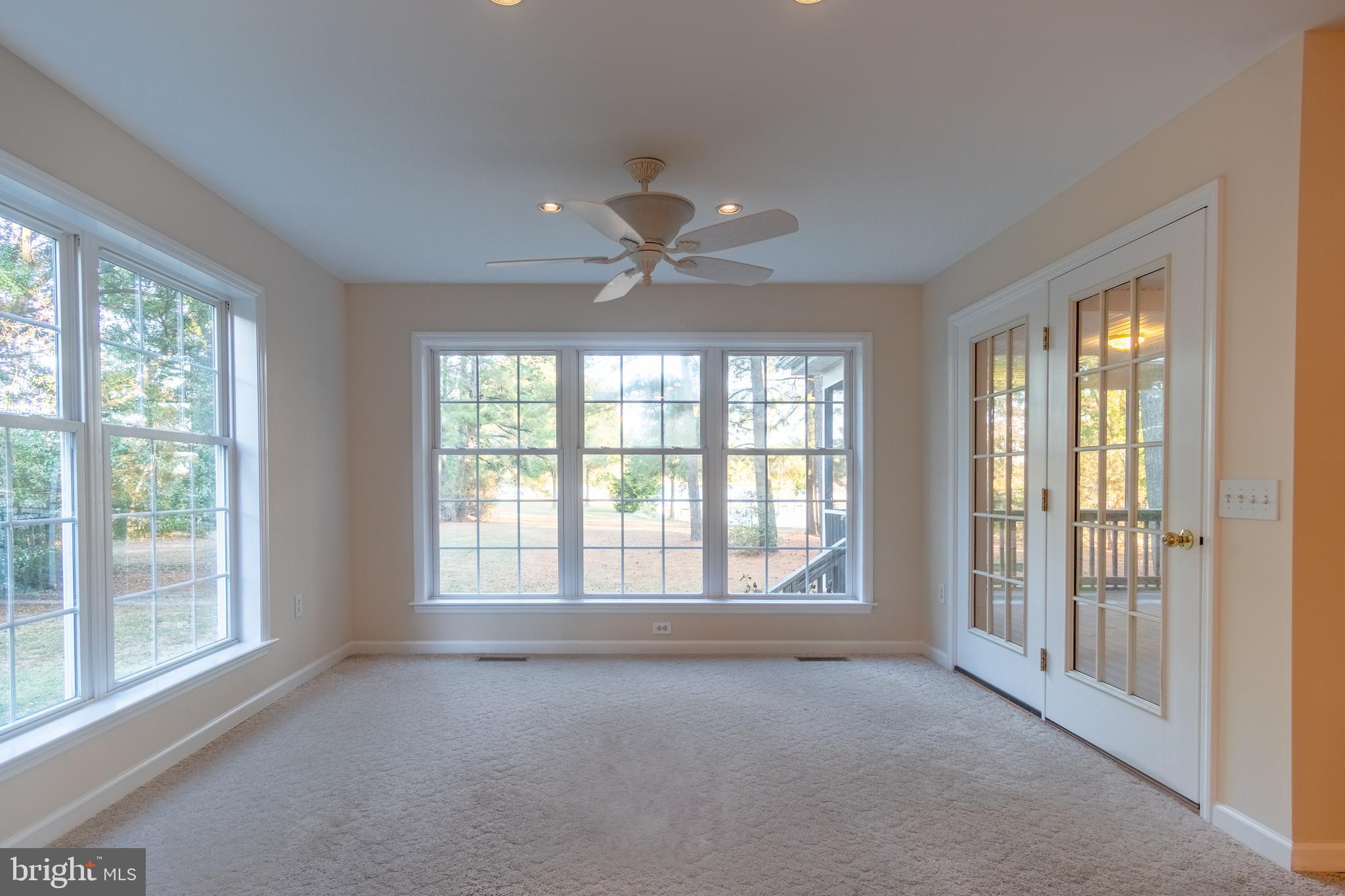 49701 Airedele Road Ridge, MD 20680 - Photo 17 of 53 Dining rm with doors leading to the screened porch