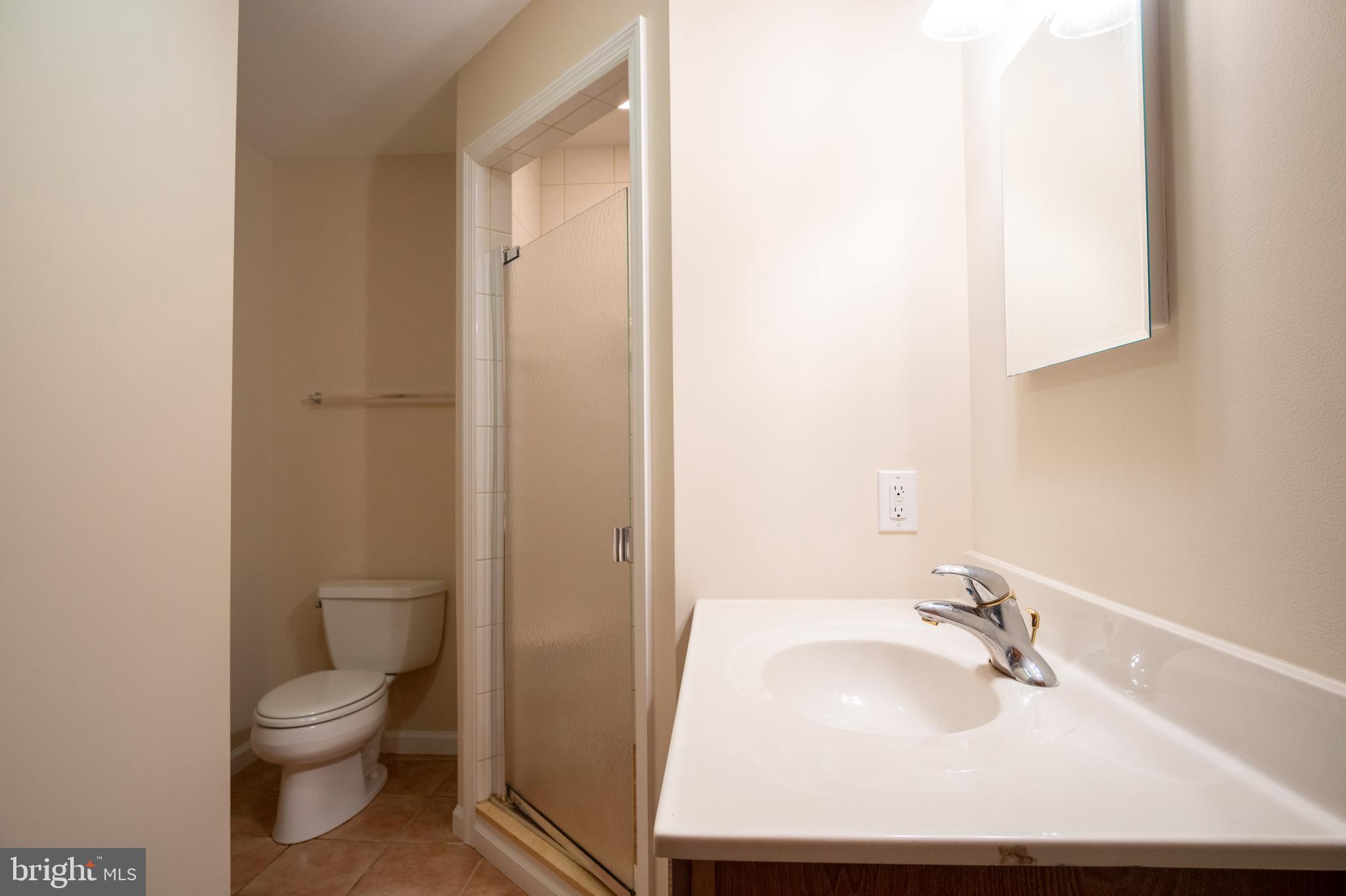 49701 Airedele Road Ridge, MD 20680 - Photo 21 of 53 Full bath in the mud room area