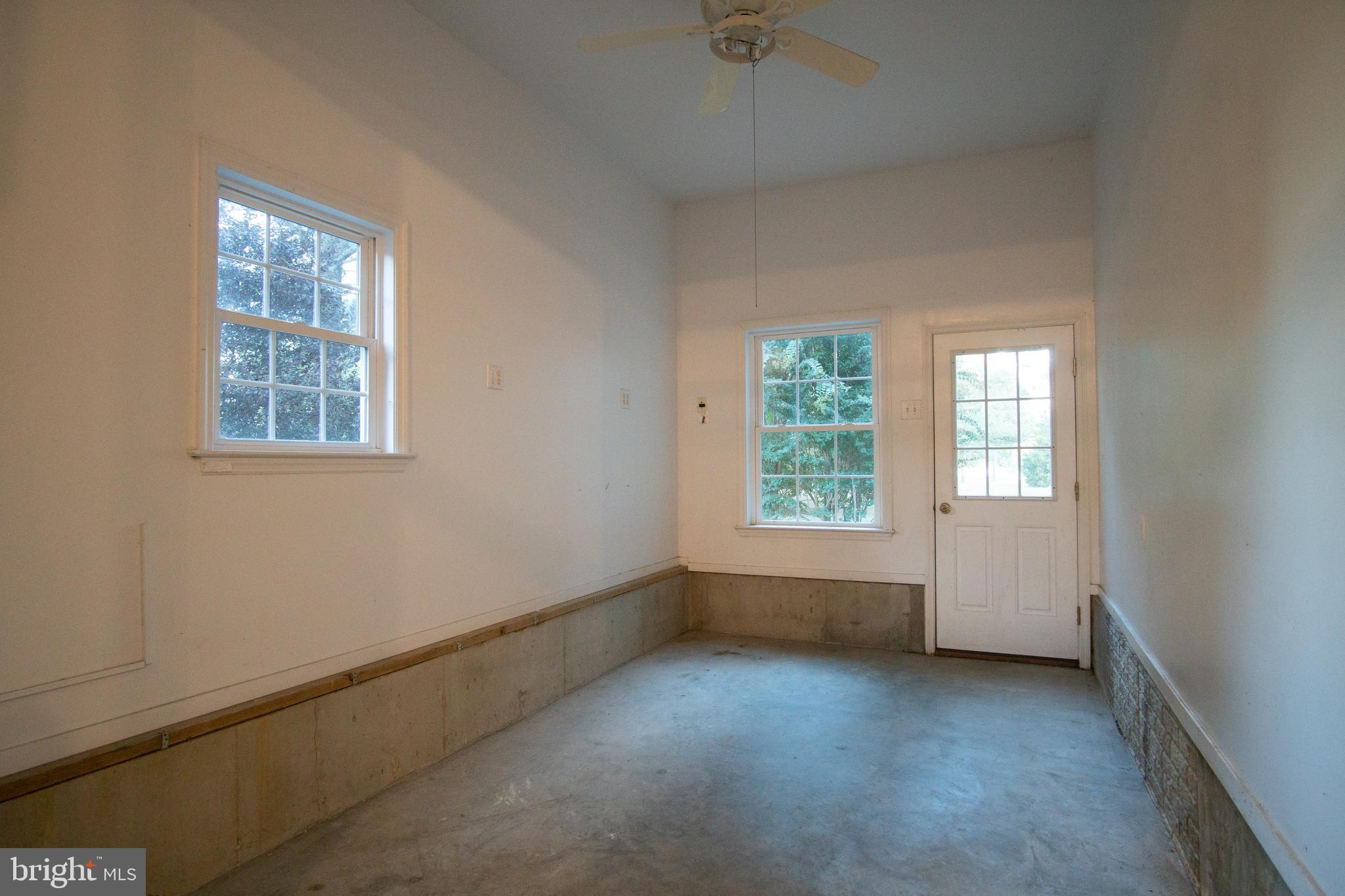 49701 Airedele Road Ridge, MD 20680 - Photo 49 of 53 Workshop area in the garage