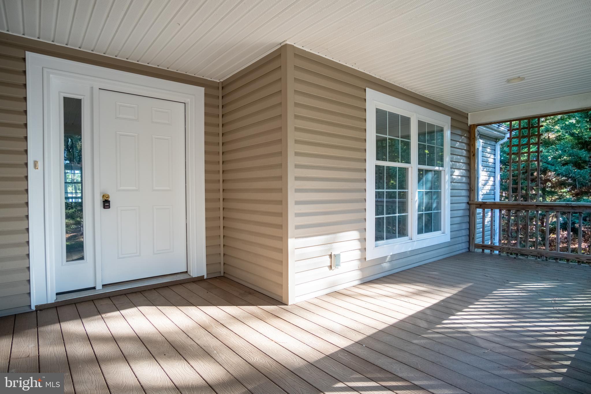 49701 Airedele Road Ridge, MD 20680 - Photo 6 of 53 Another picture of the large trex deck/porch