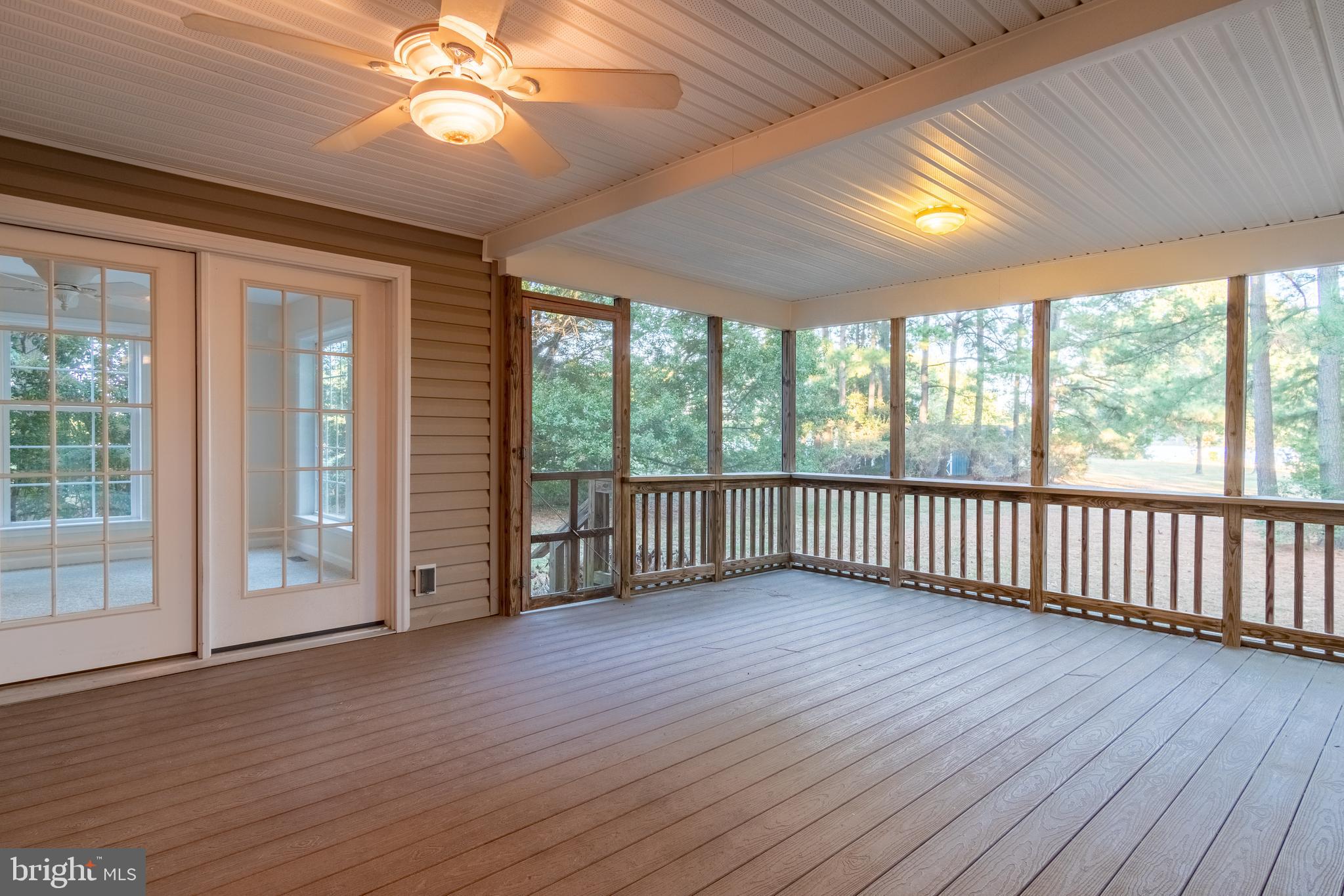 49701 Airedele Road Ridge, MD 20680 - Photo 10 of 53 Large screened in porch with ceiling fan