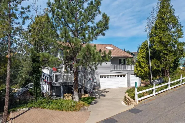 an aerial view of house with a swimming pool