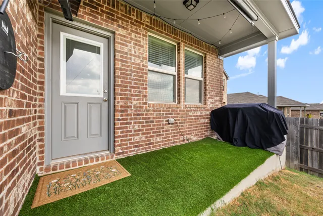 a view of a backyard with a lake view