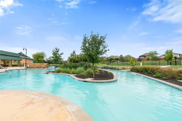 a view of a swimming pool and a lake view