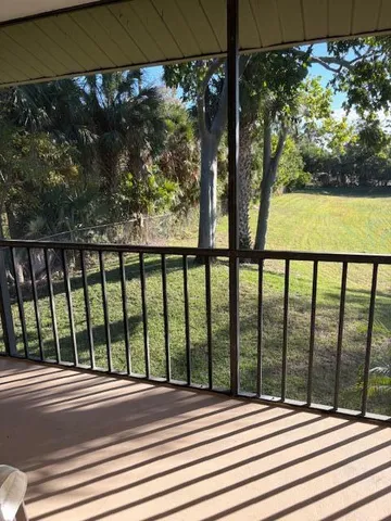 a view of a street from a balcony