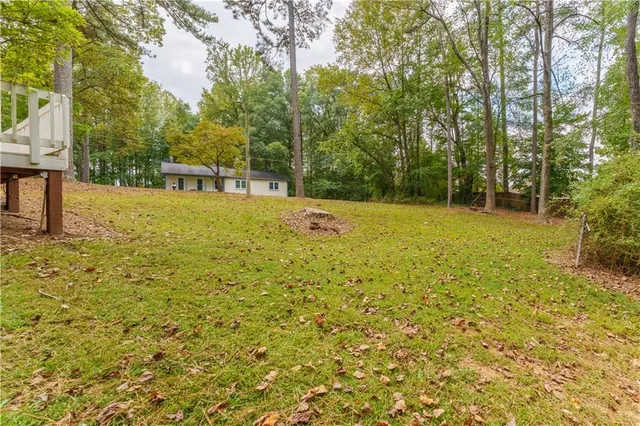 a view of a yard with a trees