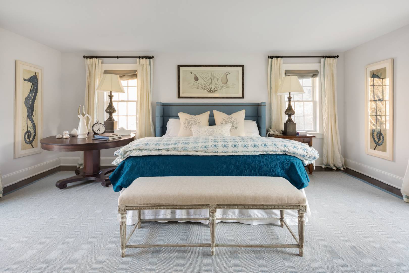 495 Ox Pasture Road Southampton, NY 11968 - Photo 13 of 28 a bedroom with a bed a table and windows