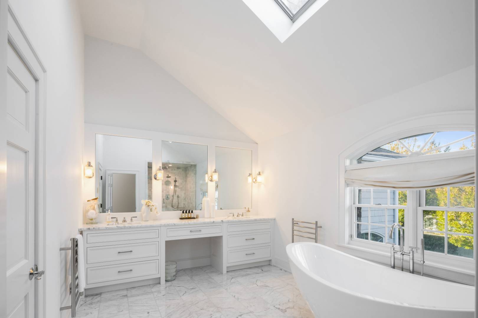495 Ox Pasture Road Southampton, NY 11968 - Photo 14 of 28 a bathroom with a granite countertop sink mirror and bathtub