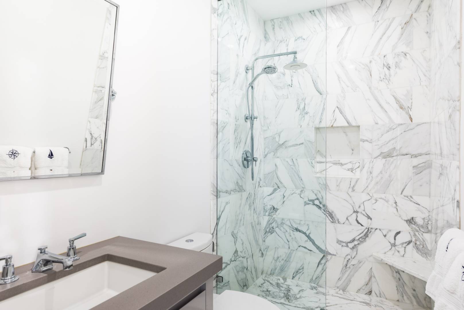 495 Ox Pasture Road Southampton, NY 11968 - Photo 17 of 28 a bathroom with a sink and a mirror