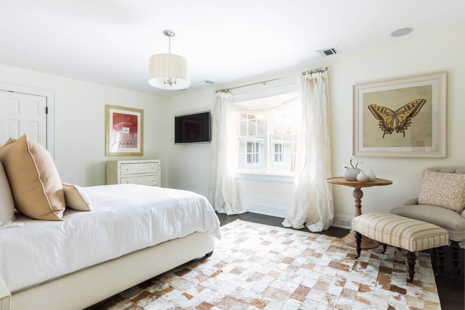 495 Ox Pasture Road Southampton, NY 11968 - Photo 18 of 28 a bedroom with a bed and wooden floor
