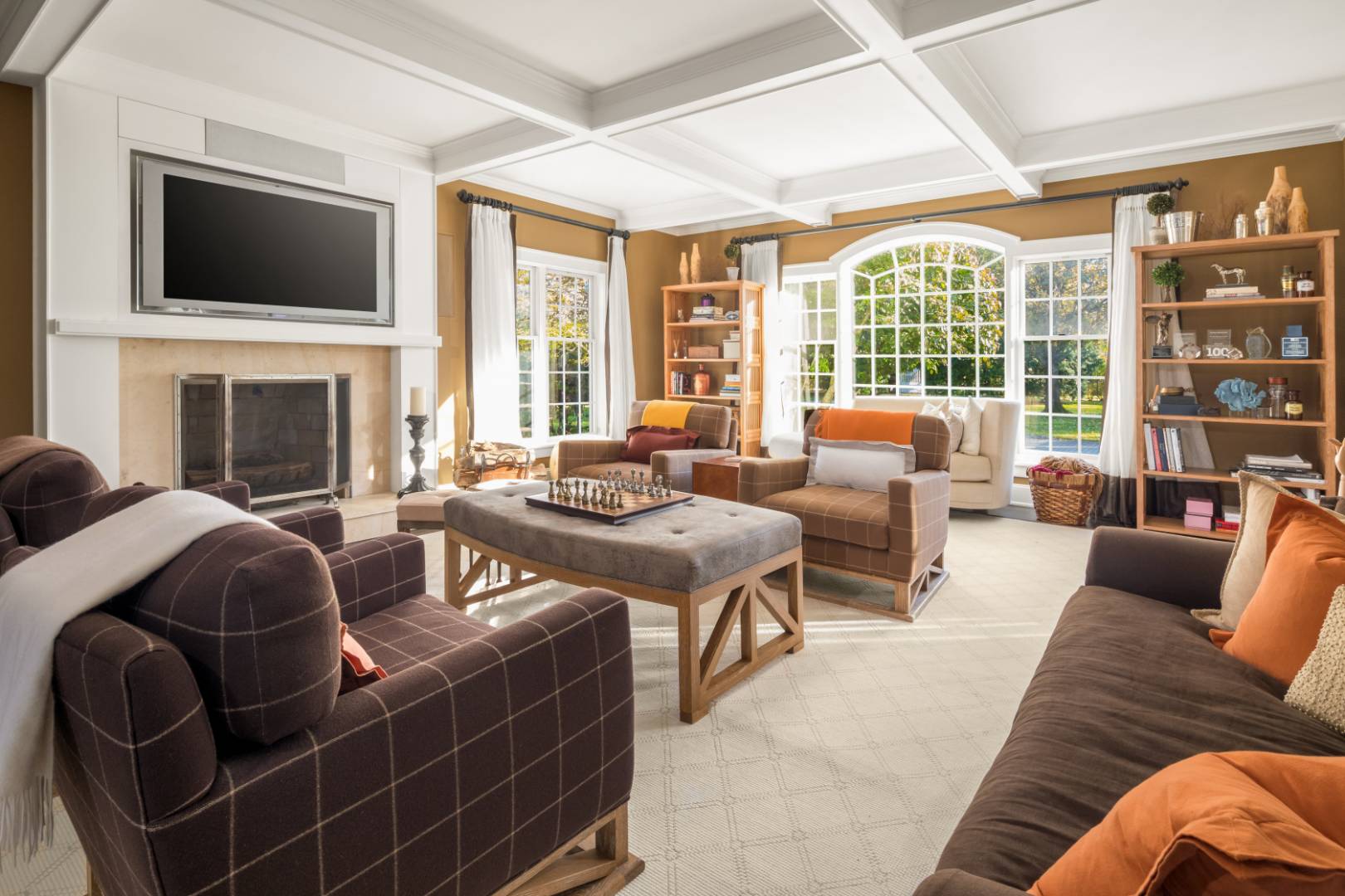495 Ox Pasture Road Southampton, NY 11968 - Photo 7 of 28 a living room with furniture a fireplace and a flat screen tv