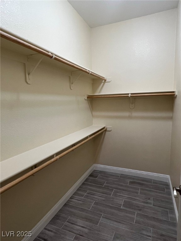 8805 Jeffreys Street, Unit 1111 Las Vegas, NV 89123 - Photo 17 of 35 Walk in closet featuring wood tiled floors