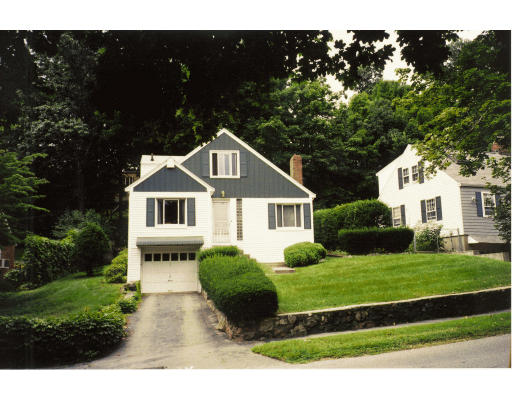 40 Ridge Street Arlington, MA 02474 - Photo 1 of 1 a front view of a house with a yard